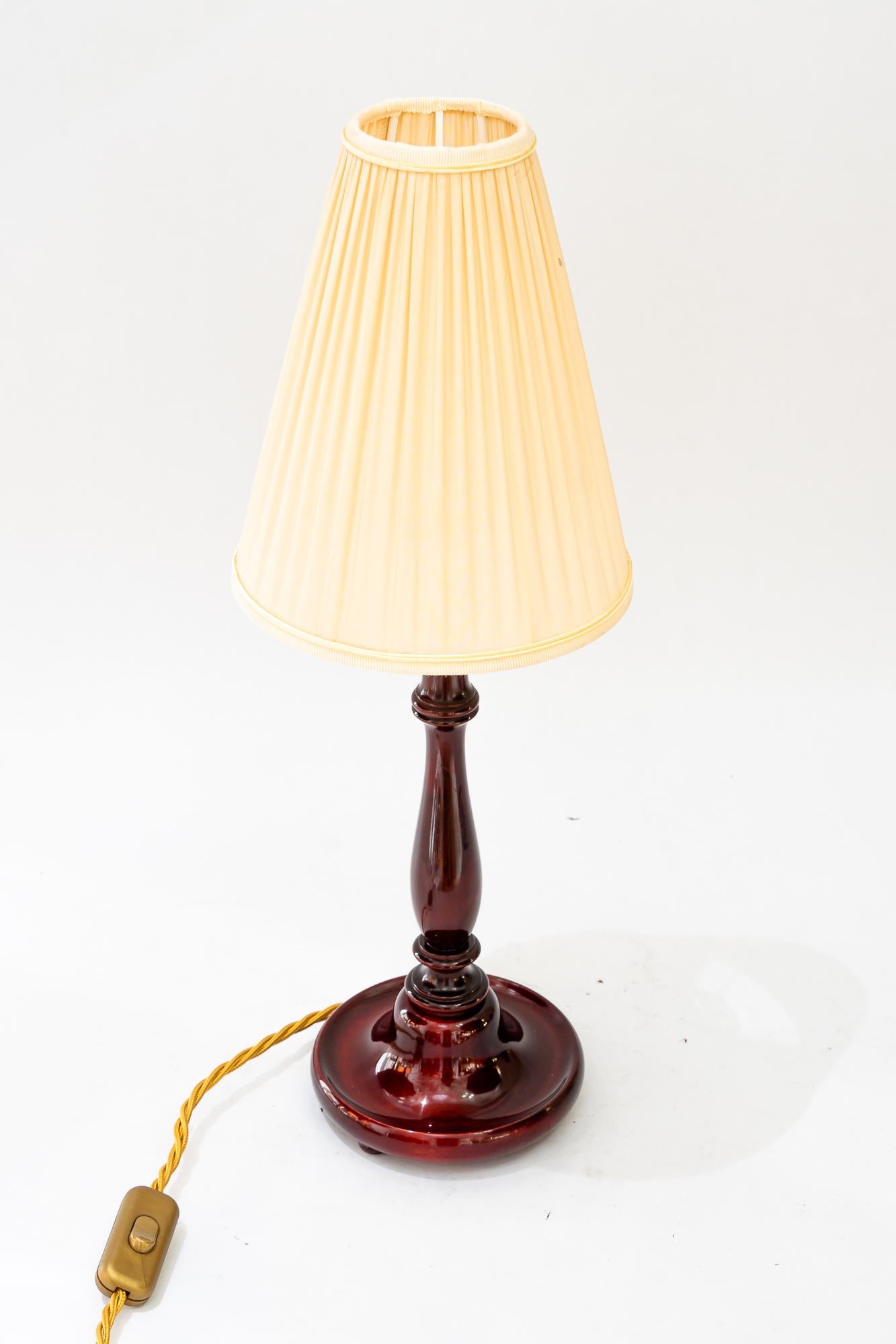 Art Deco wood table lamp with fabric shade vienna around 1920s
Wood polished 
The fabric shade is replaced ( new )