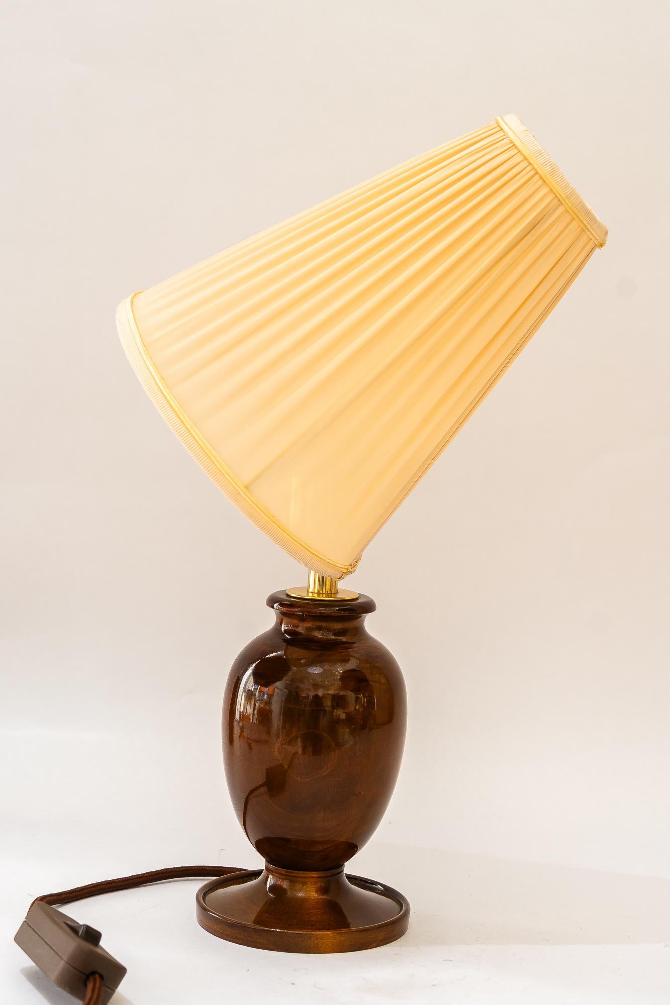 Polished Art Deco wood table lamp with fabric shade vienna around 1920s For Sale