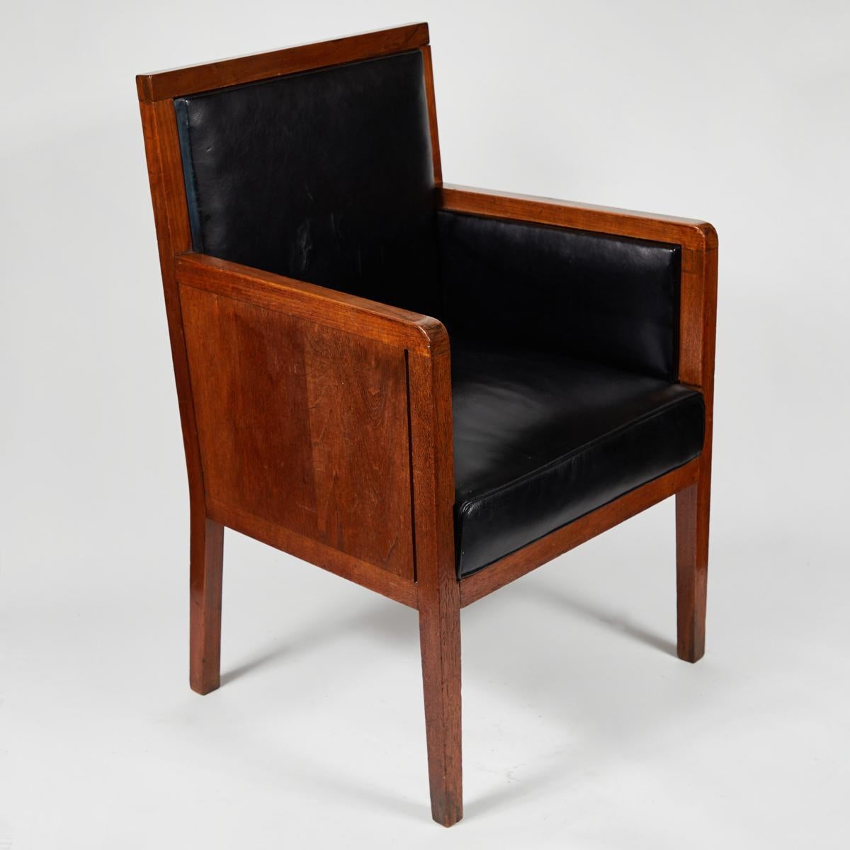 Art Deco wooden armchair upholstered in blue leather from France.