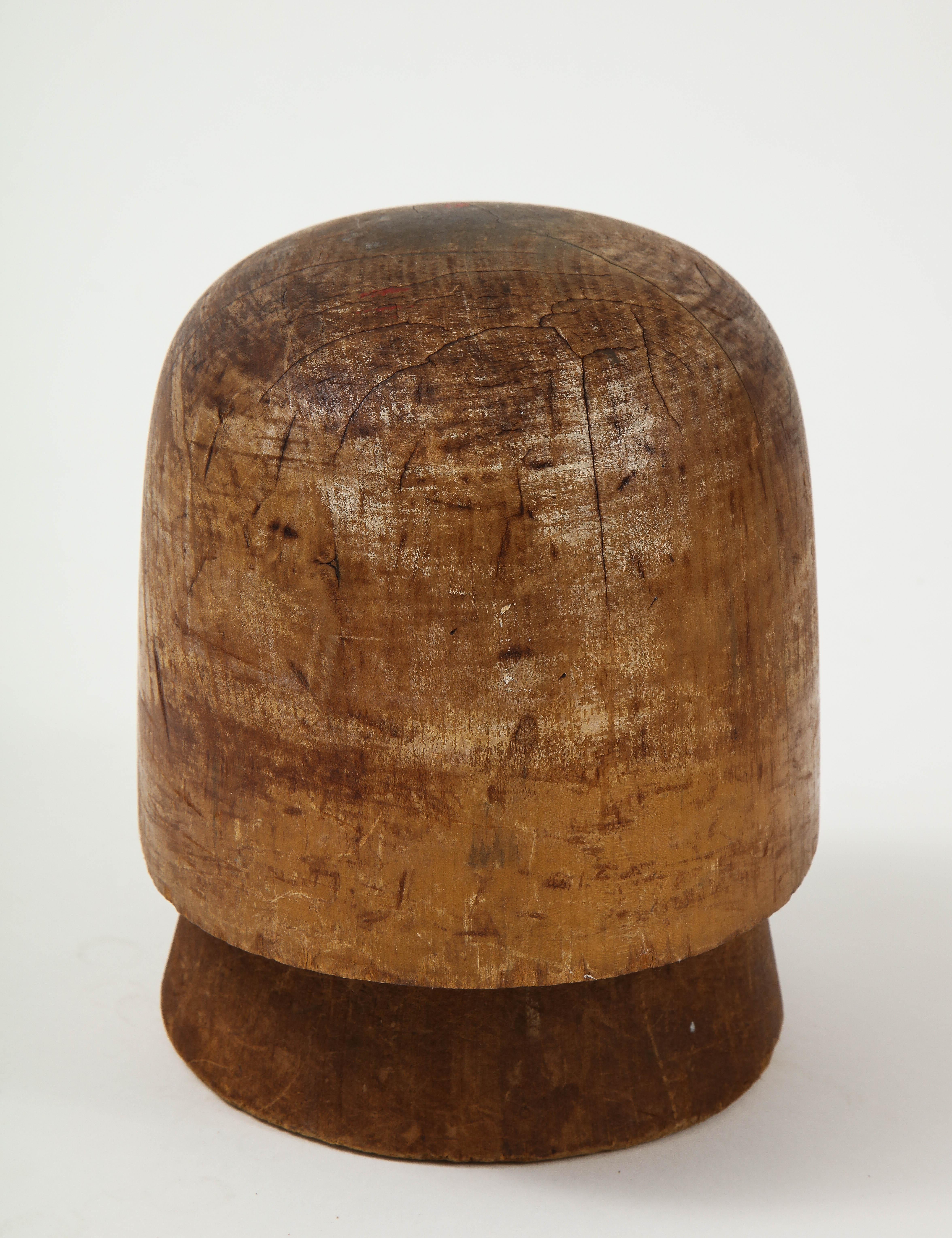 Nicely aged 2-piece wooden cloche hat form.