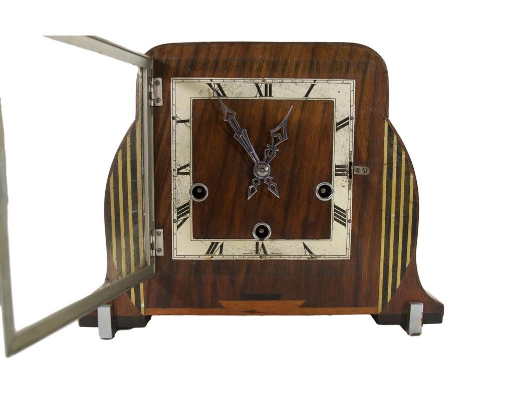 Art Deco wooden mantel clock. The perfect piece for a desk, mantel or living area.