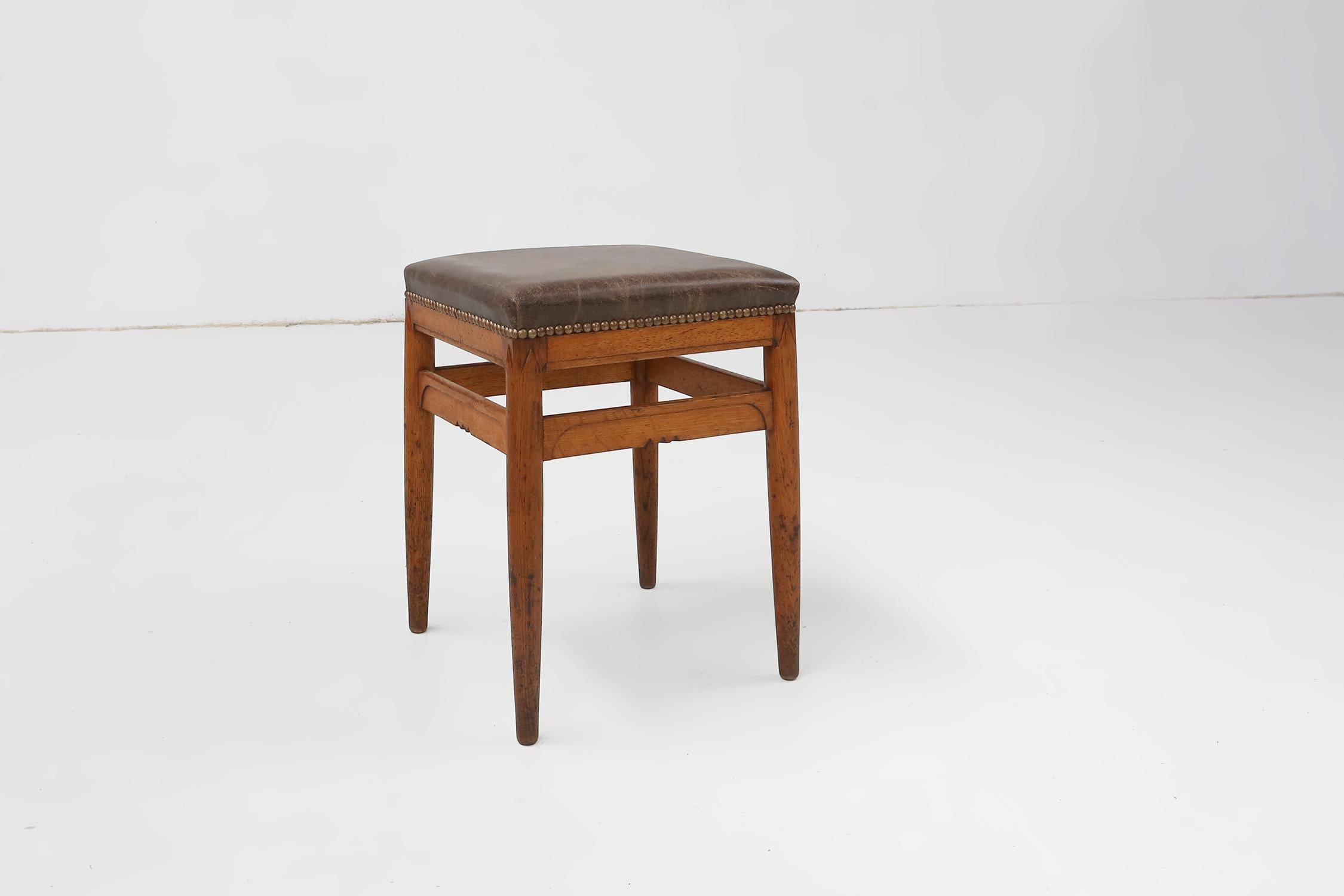 Hand-Carved Art Deco wooden stool with leather top, Belgium ca. 1920 For Sale
