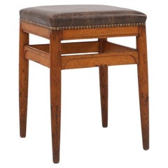 Antique Art Deco wooden stool with leather top, Belgium ca. 1920
