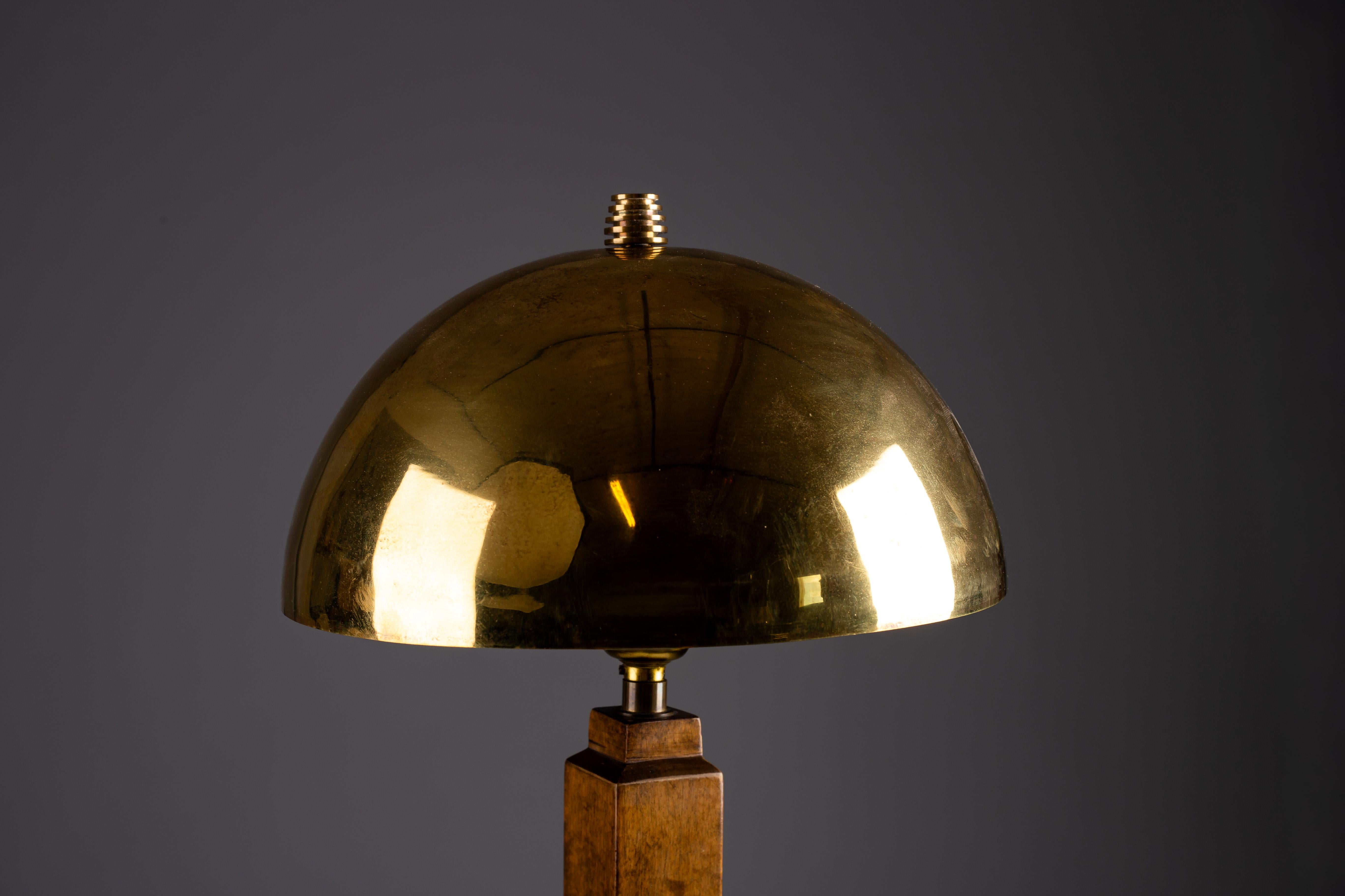 20th Century Art Deco wooden table lamp with brass shade For Sale