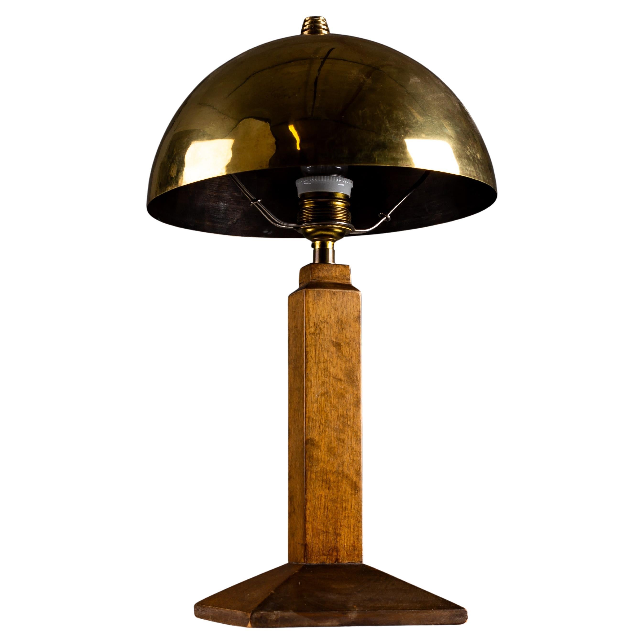 Art Deco wooden table lamp with brass shade For Sale