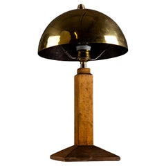 Art Deco wooden table lamp with brass shade