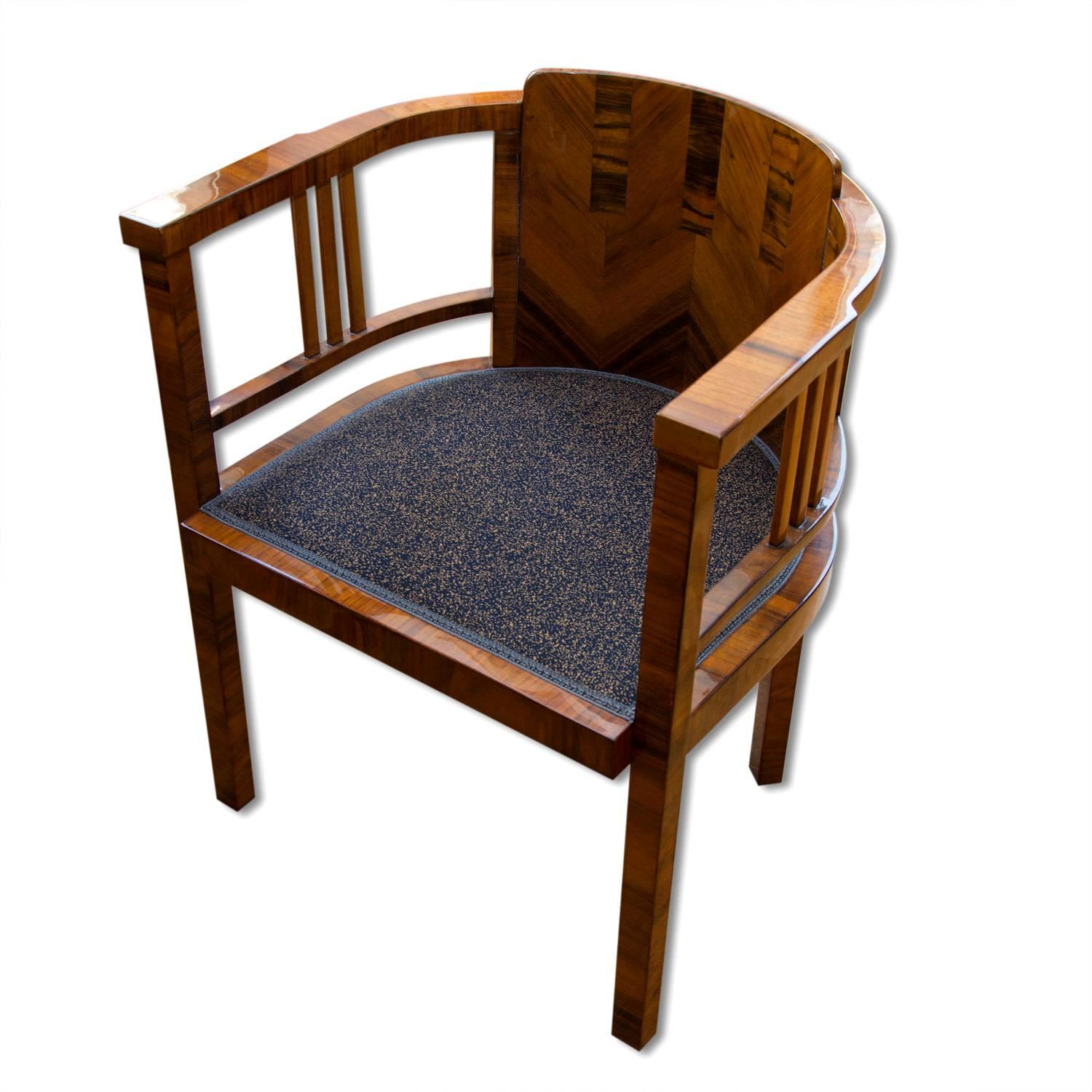 This Art Deco desk chair was made in Bohemia in the 1930s. It´s a part of the writing desk. Comes from an apartment in the center of Prague where it was part of the equipment from the 1930s to the present. The chair features a walnut veneer, new