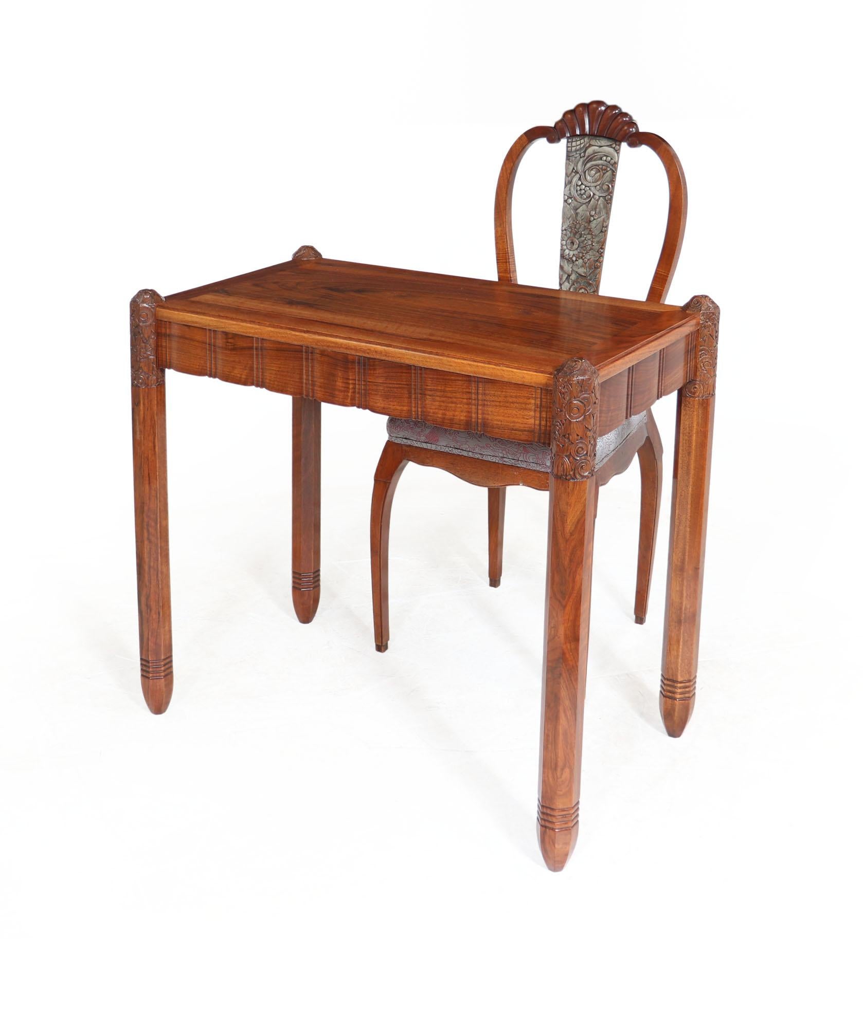 DESK AND CHAIR BY SUE ET MARE
A French Art Deco ladies writing desk and chair of exceptional quality by Louis Sue and Andre Mare produced around 1925, it is solid walnut with octagonal legs with ornate carving to the top, the sides are scalloped