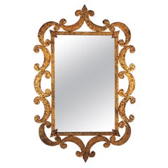 Art Deco Wrought Gilt Iron Mirror with Scroll Detailing, France, 1930s
