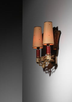 Art Deco wrought iron and églomisé glass wall sconce, Raymond Subes style, 1930s