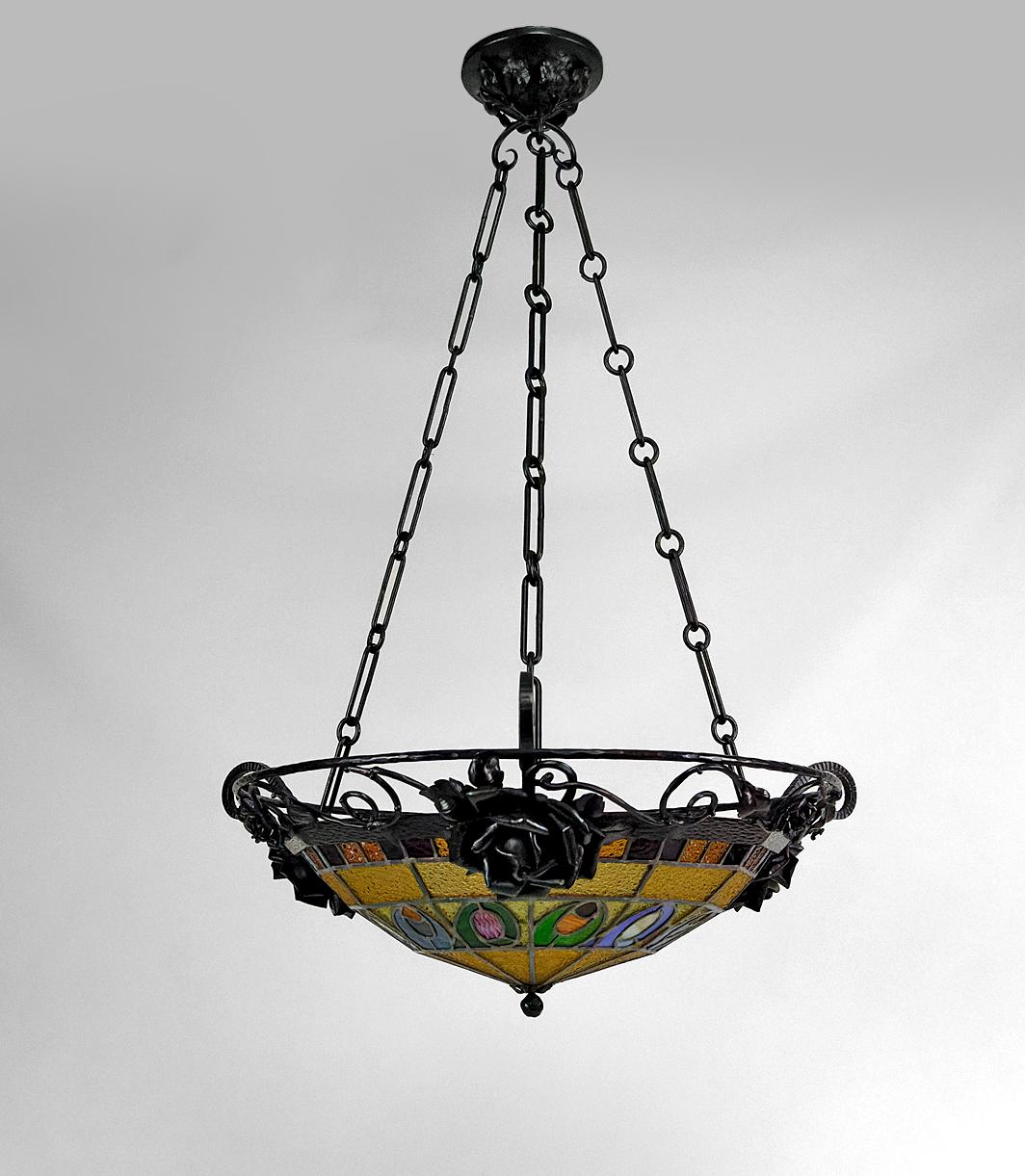 Art Deco wrought iron chandelier by Augustin Louis Calmels

Augustin Louis CALMELS (1880-1971) was a painter and creator of stained glass windows, active in the southwest of France during the Art Nouveau and Art Deco periods.

France, Circa 1920

In