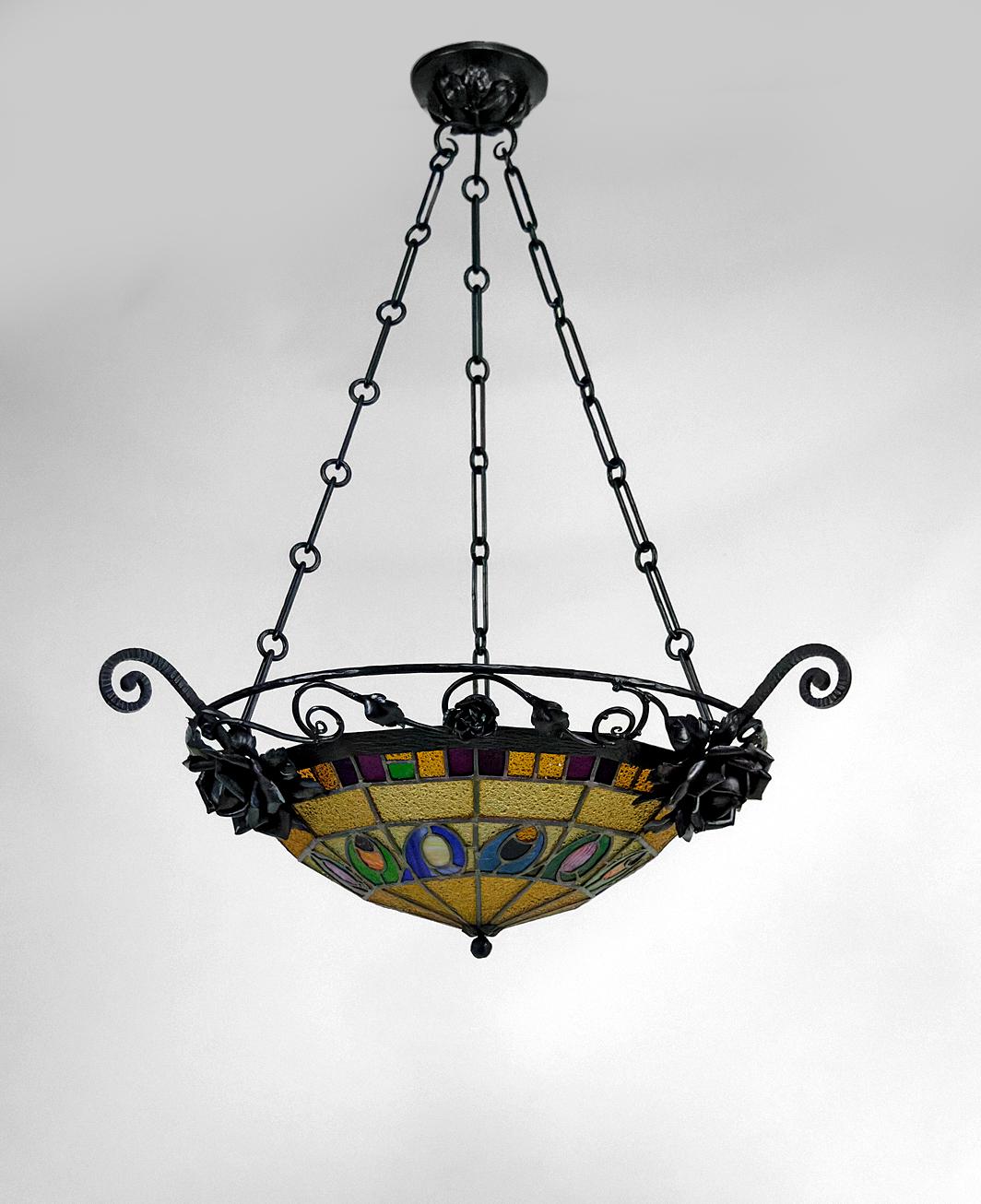 French Art Deco wrought iron chandelier by Augustin Louis Calmels, France, Circa 1920 For Sale