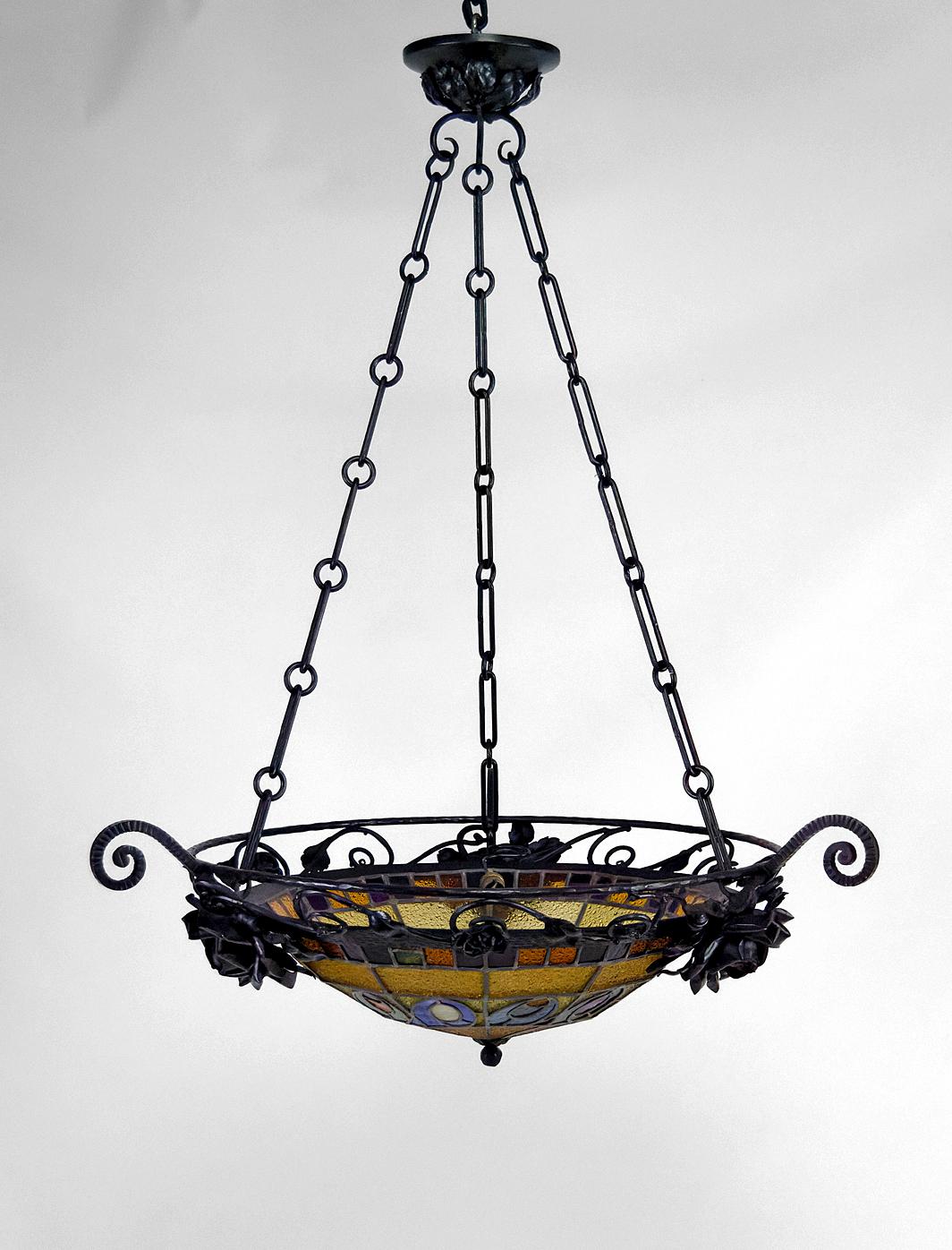 Early 20th Century Art Deco wrought iron chandelier by Augustin Louis Calmels, France, Circa 1920 For Sale