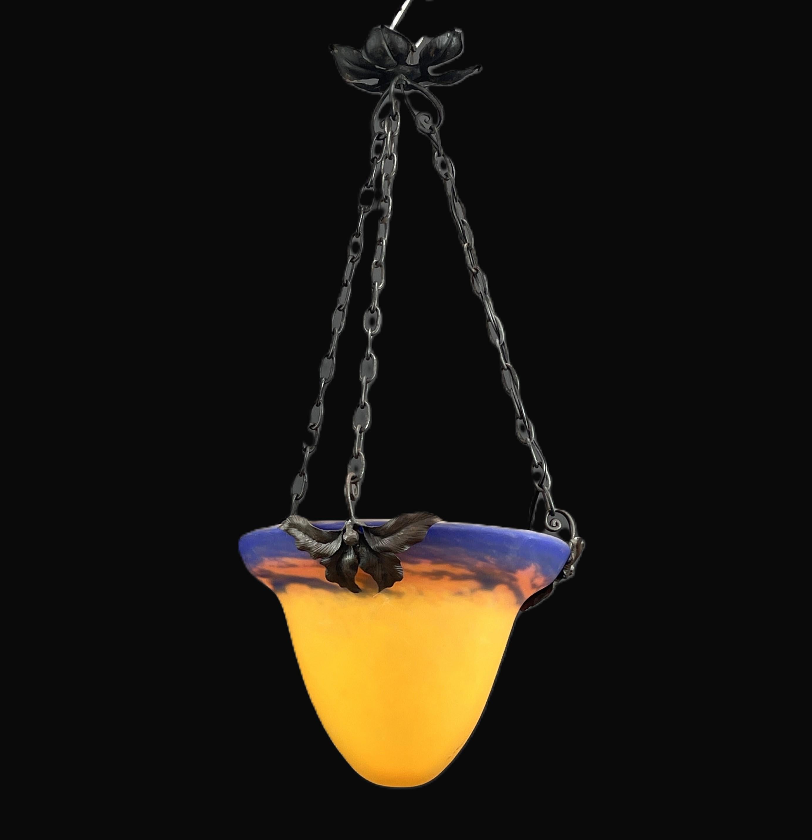 art deco ceiling lamp by  Muller Frères Lunéville

The ART DECO ceiling lamp is a remarkable example of the craftsmanship and style of the early 20th century.
The signature 