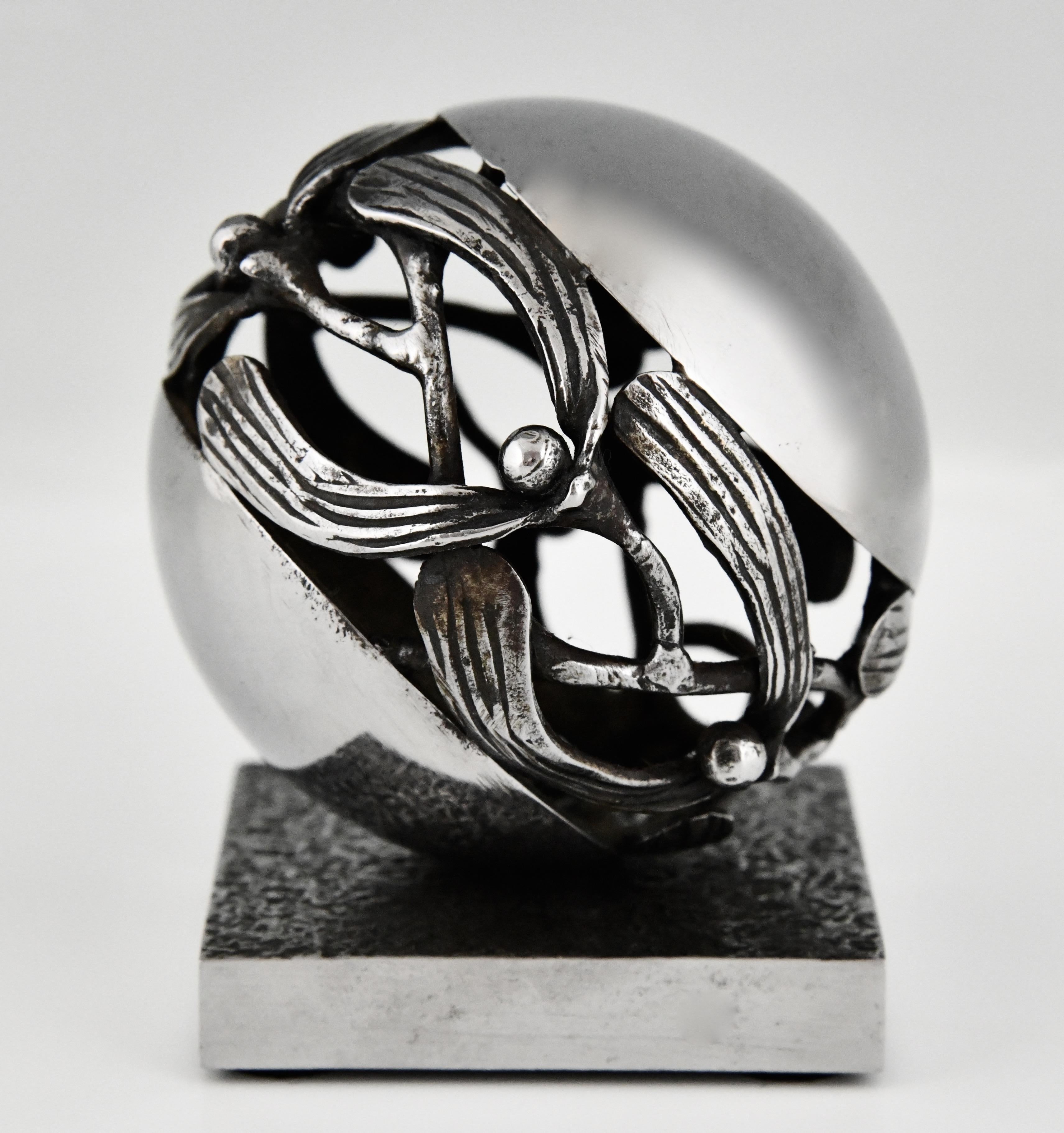 Art Deco wrought iron Mistletoe paperweight by Edgar Brandt. 
In French this model is called Boule de Gui. 
Wrought iron with chromed finish. France 1921.
We have a pair available, sold individually. 
This model is illustrated on page 114 of the