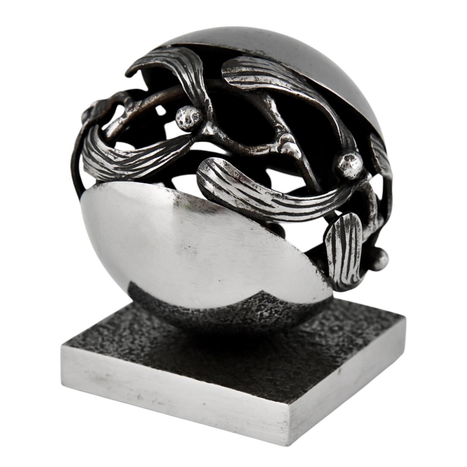 Art Deco wrought iron Mistletoe paperweight by Edgar Brandt. 
In French this model is called Boule de Gui. 
Wrought iron with chromed finish. France 1921.
We have a pair available, sold individually. 
This model is illustrated on page 114 of the