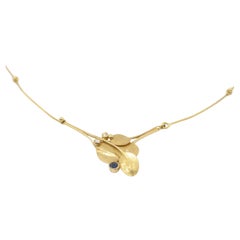 Art deco Wurzbacher necklace made of 18k yellow gold with sapphire and diamond