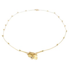 Collar Art déco Wurzbacher de oro amarillo de 18 quilates con zafiro y diamante