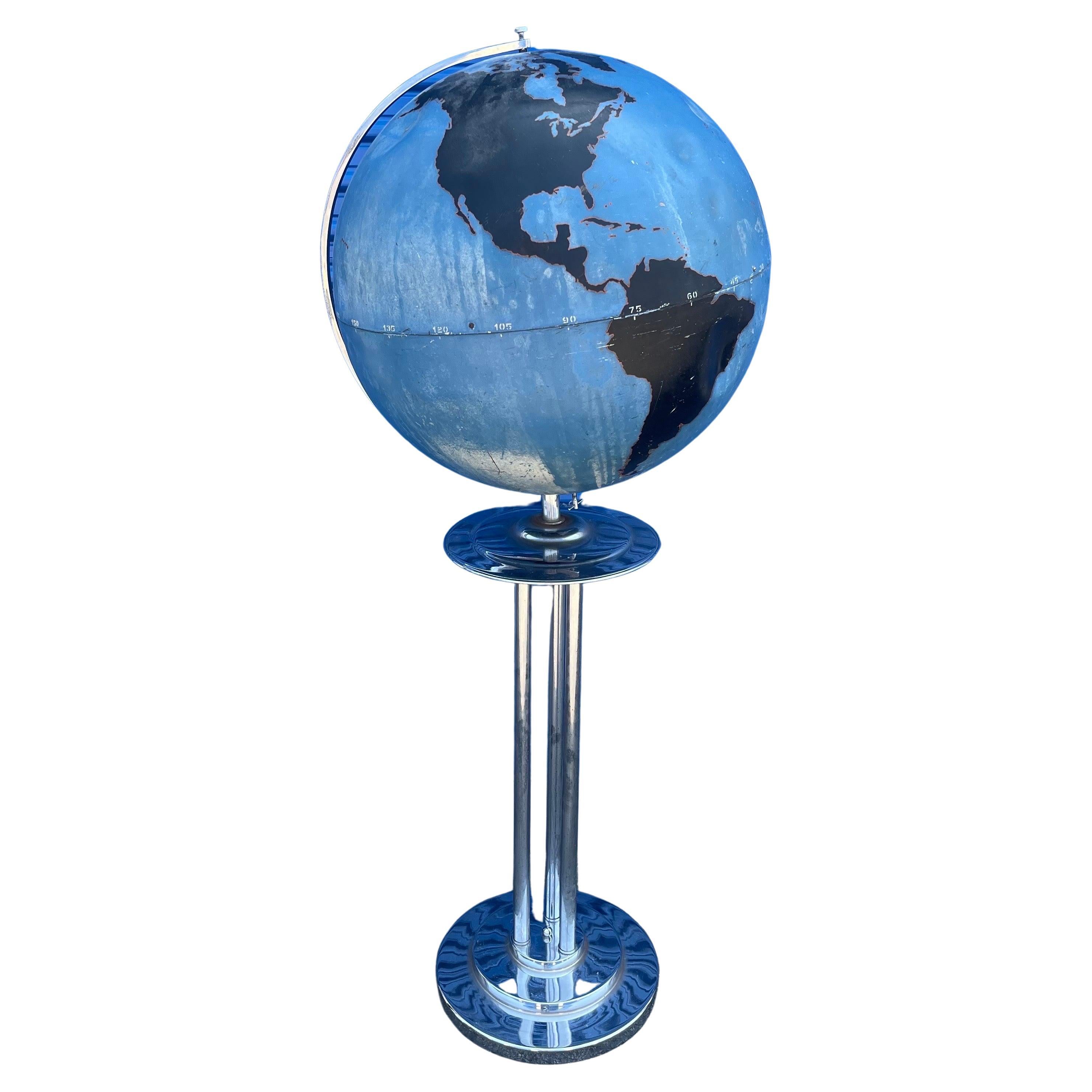 Rare art deco WWII military strategy chalk teaching globe by Denoyer-Geppert with period chrome stand, circa 1940s. The globe is in good condition with original paint; there are several dents and dings on the sphere.  The globe is attached to a