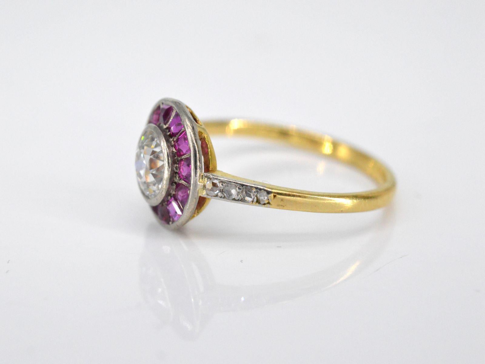 Old European Cut Art Deco Yellow Gold Ring with Central Diamond Surrounded by Ruby For Sale