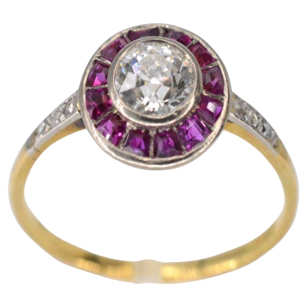 Art Deco Yellow Gold Ring with Central Diamond Surrounded by Ruby For Sale
