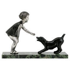 Sculpture Art déco jeune fille et chien de P.Sega, 1920