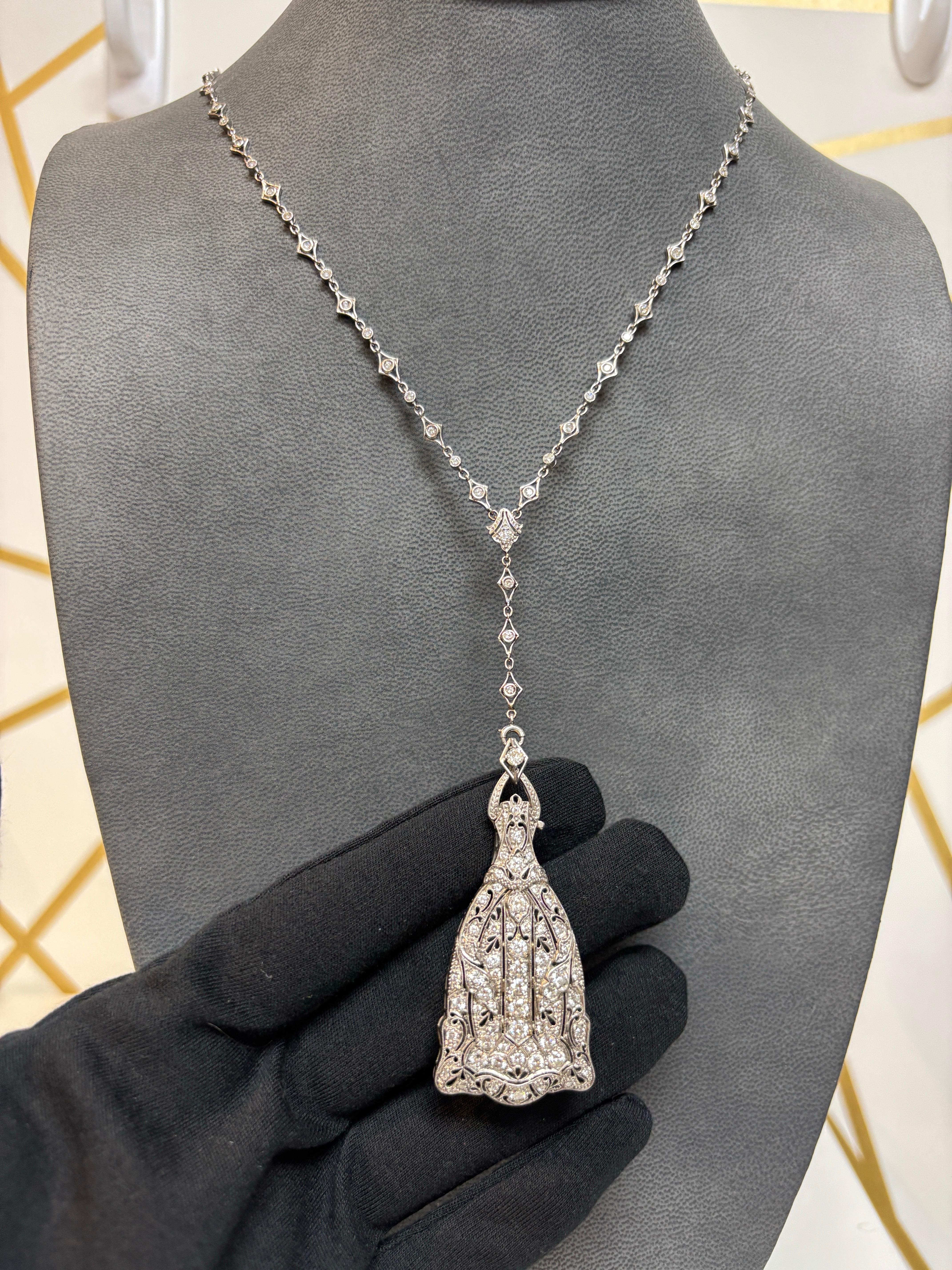 Art Decoo Diamond Lorgnette Necklace

The pendant includes a latch mechanism that opens to reveal functional eyeglasses and is removable from the chain

Approximate Length: 27 inches 
Approximate Pendnat Length: 2.75 inches
Metal Type: Platinum 