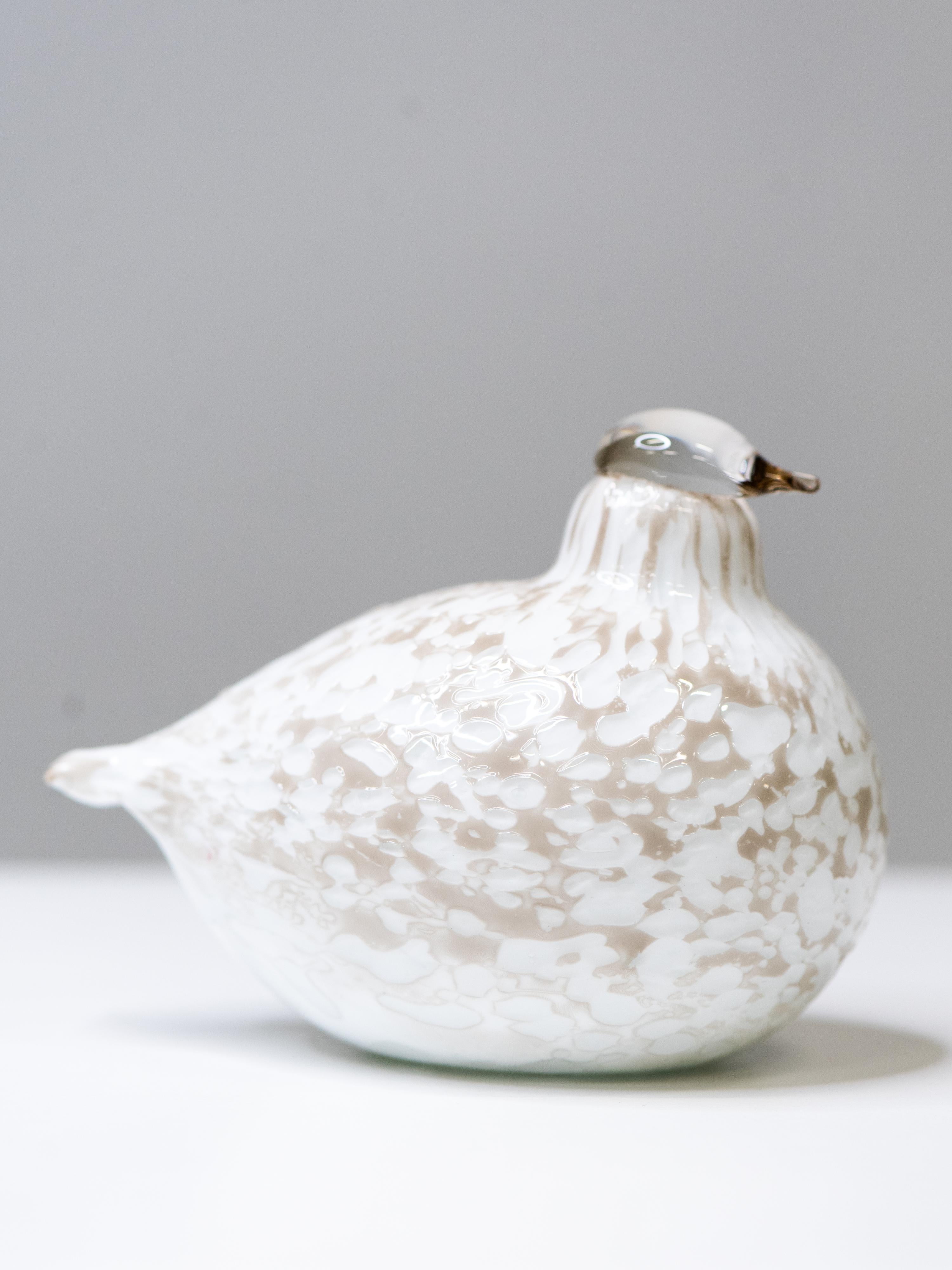 Hand-blown glass bird from Oiva Toikka’s celebrated Birds by Toikka collection for Nuutajärvi. The model Riekko - Finnish for willow grouse - was created with softly speckled beige and white glass that gives the bird its distinctive down-like