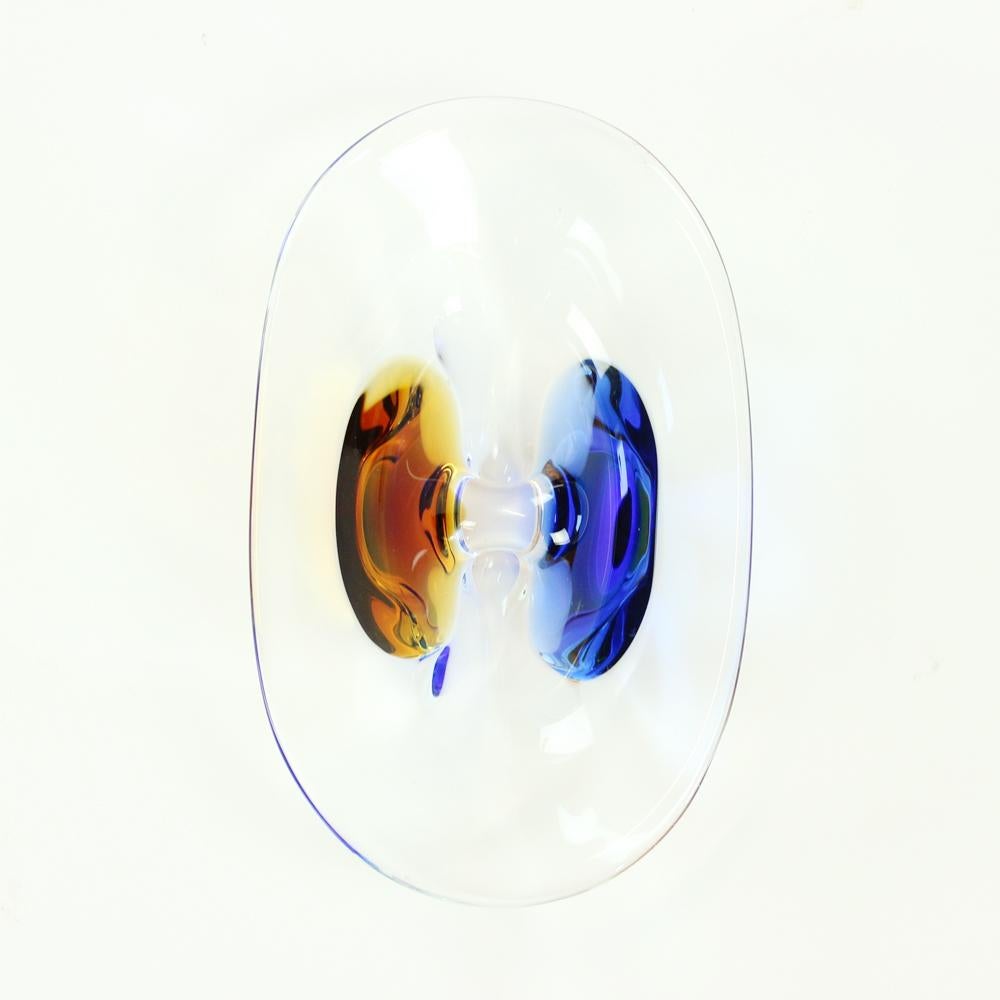 Beautiful metallurgical glass bowl from designer Frantisek Zemek. Excellent condition without any wear or signs of use. Made of clear metallurgical glass with amber and cobalt glass details. Strong and heavy bowl, suitable to any interior.
