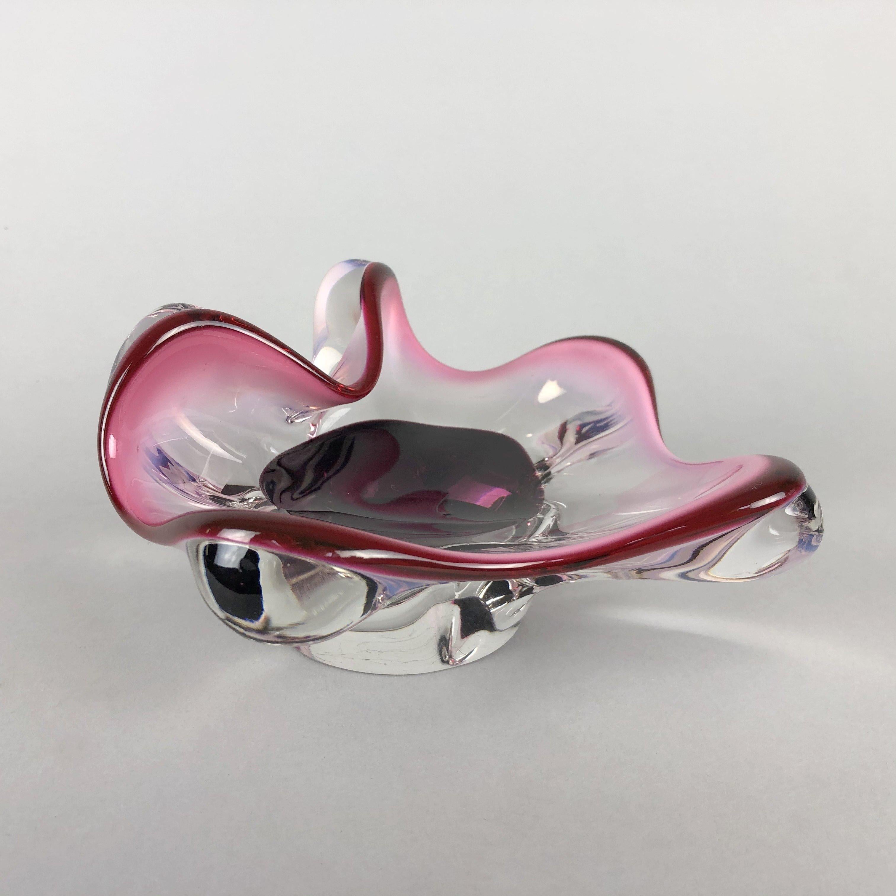 Small Czech sculptural glass bowl, designed by Josef Hospodka in the 1960's and made by the Chribska glassworks. The bowl is aproximatelly 8 cm (3.15 inch) high (at the highest point and 16 cm (6.3 inch) wide (at the widest point). The weight is
