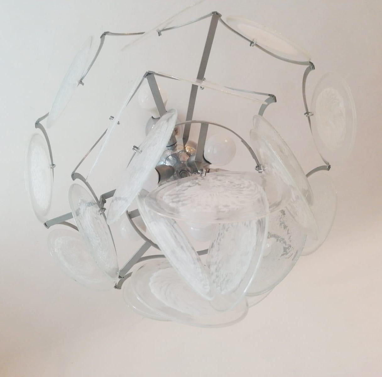 Beautiful and rare chandelier with white and clear glass tear drop shaped art glass crystals.