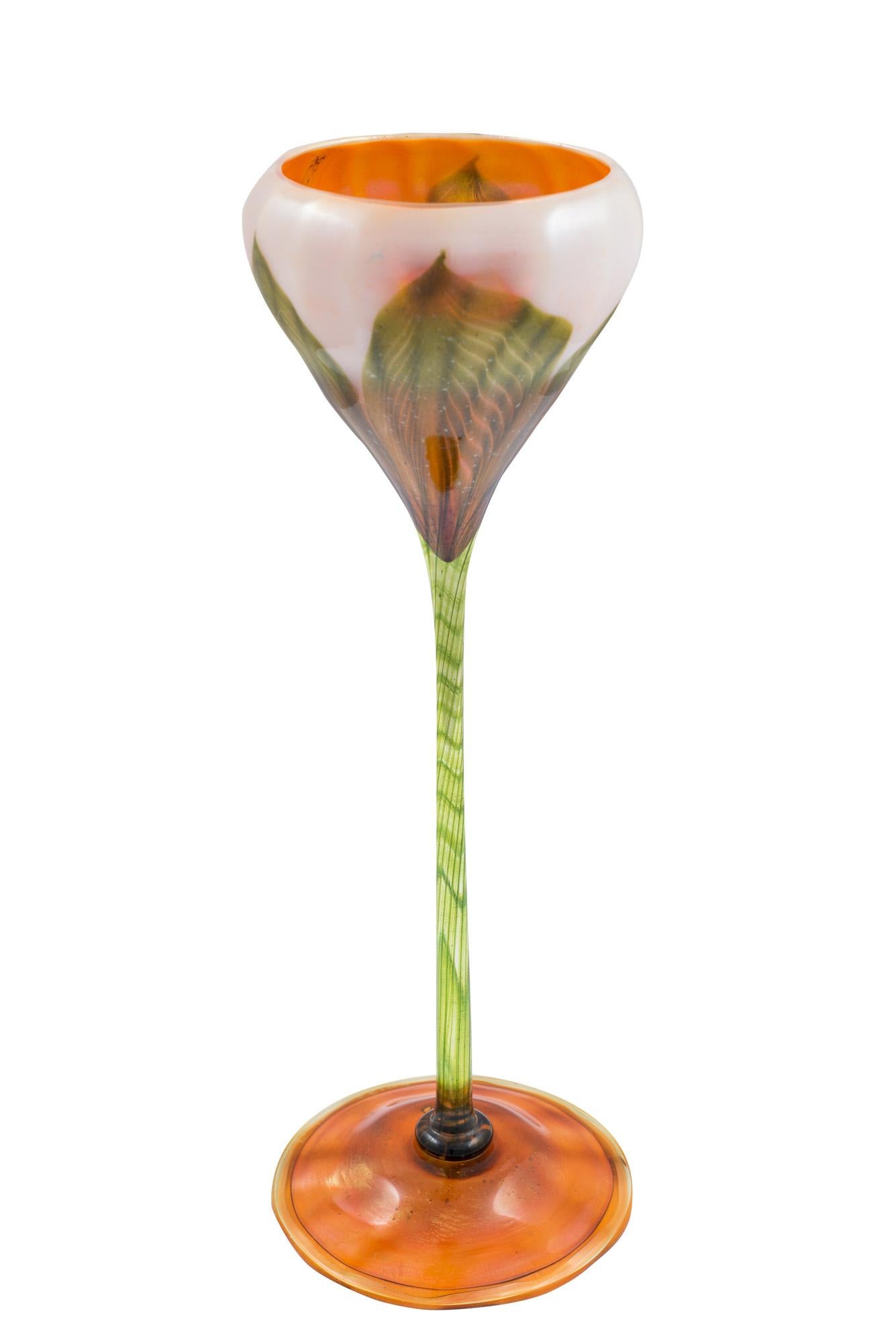 Art glass Floriform vase Louis Comfort Tiffany Studios New York 1906 green orange

The company Louis comfort Tiffany was one of the most important and most famous art manufactures in America around the turn of the century. Next to the famous lamps