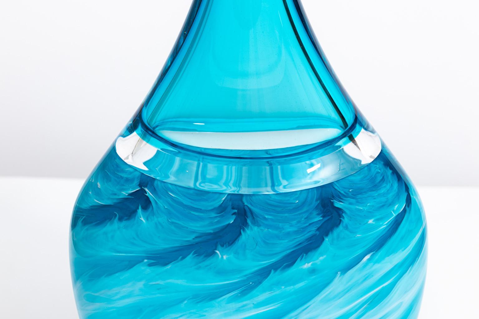 Art glass vase. 25.00 inches high. Artist-signed. Hand blown. Blue wave design. Polished pontil. Vibrant colors.