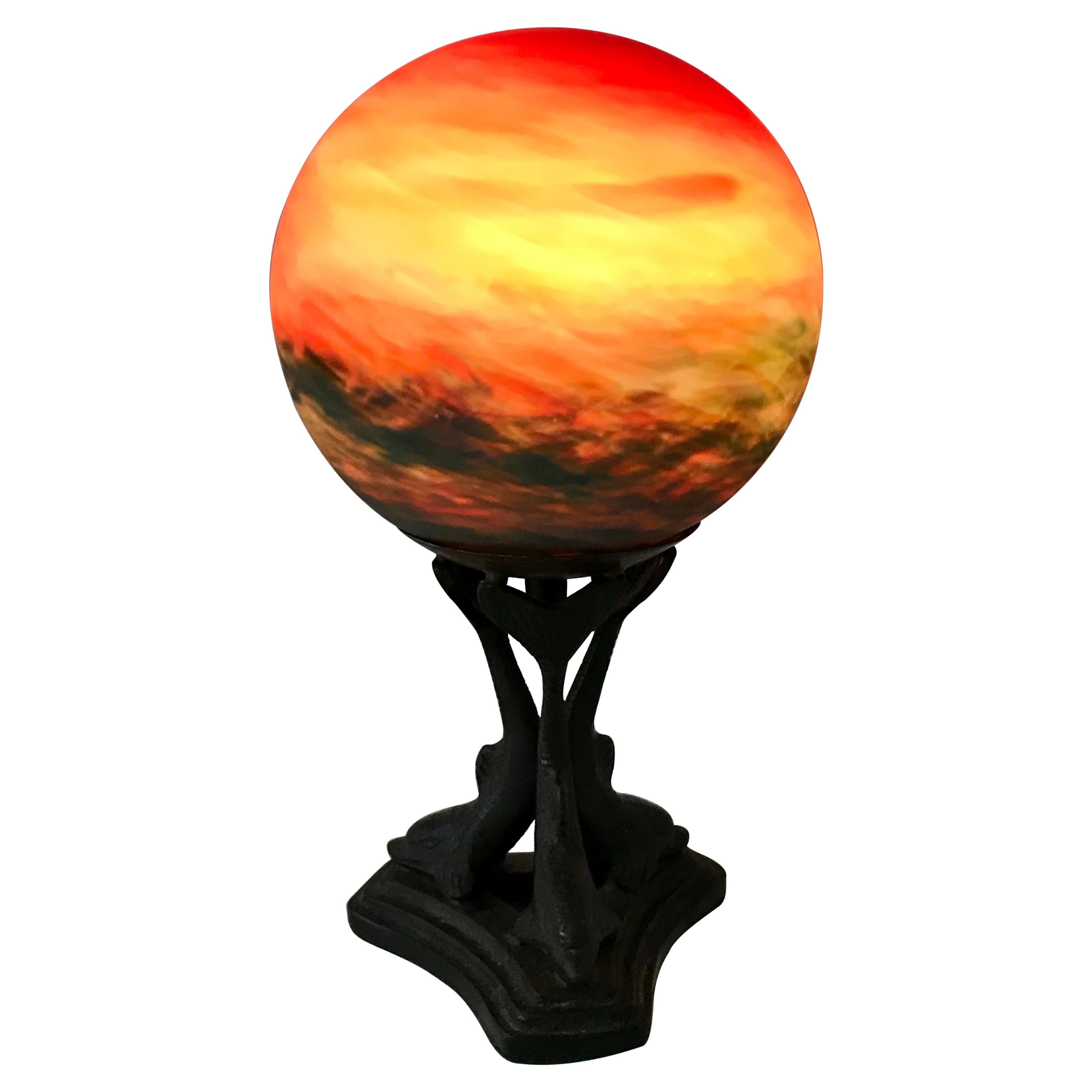 Art Glass Globe Table Lamp Mounted on Bronze Dolphin Base, Art Deco Era