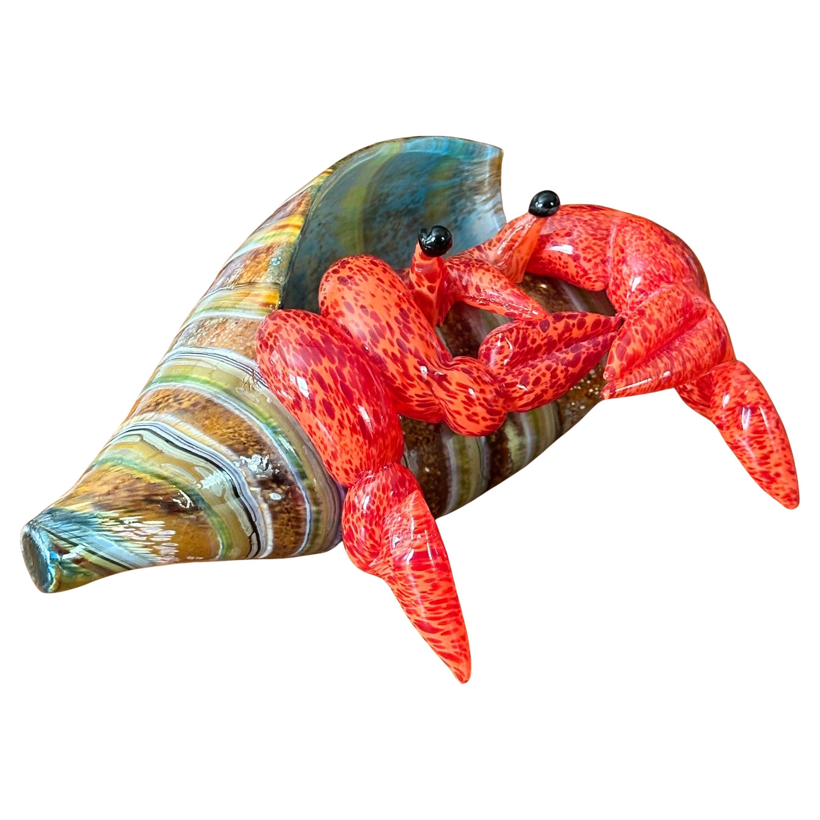 Incredible art glass hermit crab sculpture by Marty Hook & Janet Sweeney, circa 1990s. The piece is in excellent condition with no visible imperfections and has great clarity; the piece measures 7