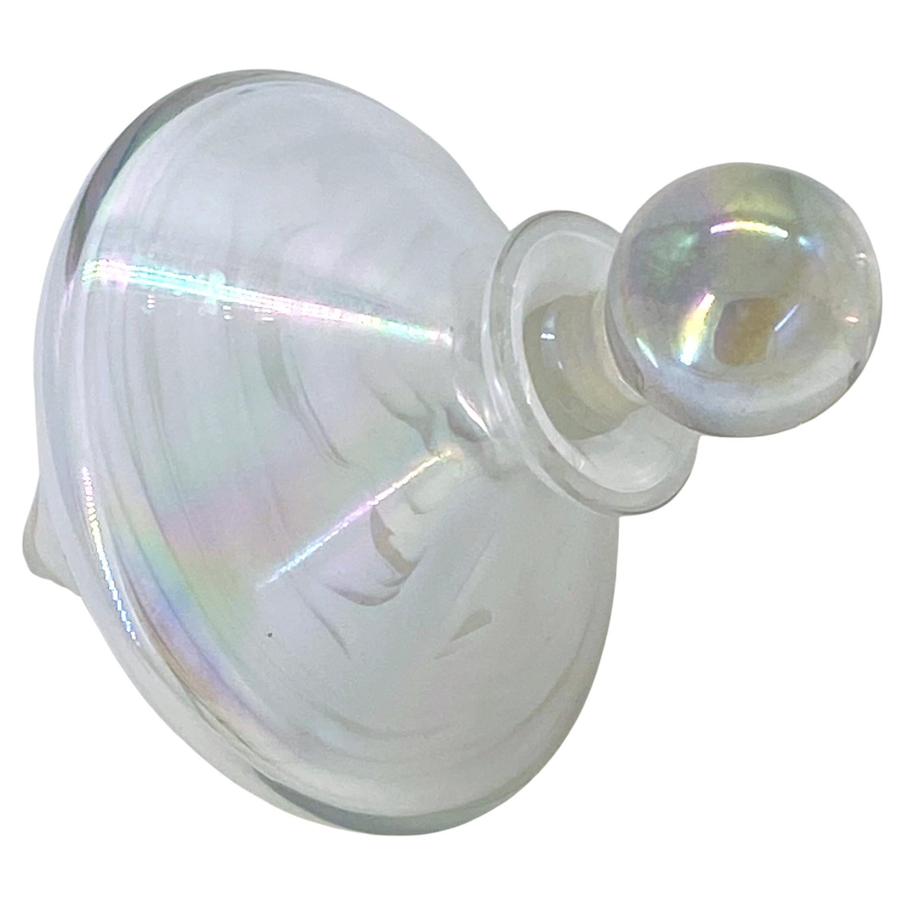 This is a aurora borealis coated art glass spinning top shaped perfume bottle with a ball shaped stopper.
It would be a great gift item for those who enjoy the vintage life style.

Nouveau Boutique does not just have great collections of jewelry, we