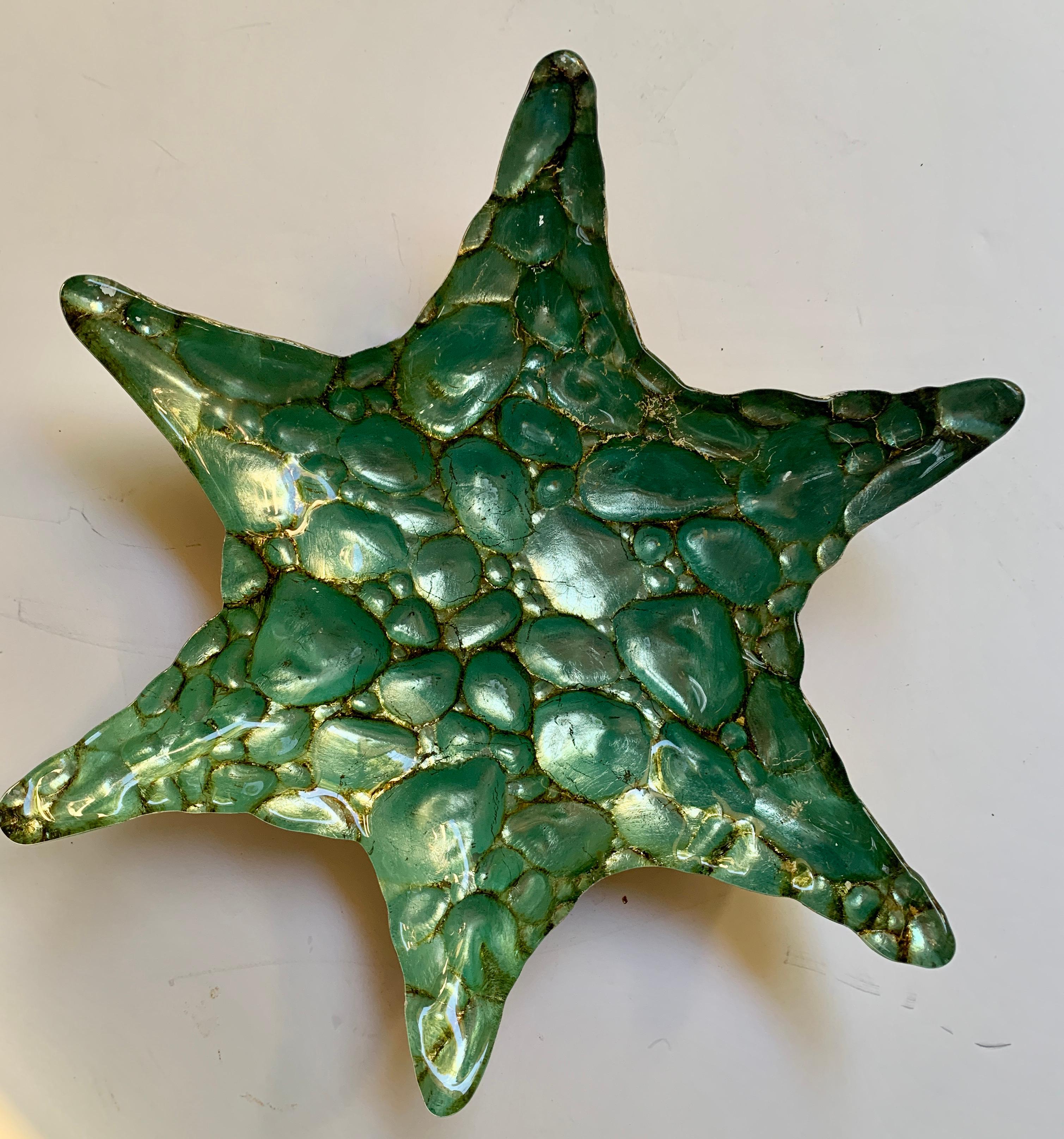 A unique starfish of art glass - the piece is reverse painted green with gold leaf overlay. A wonderful addition to homes near the water, perfect for serving or holding fruit or nuts. Also a Nice catchall at the door or desk.