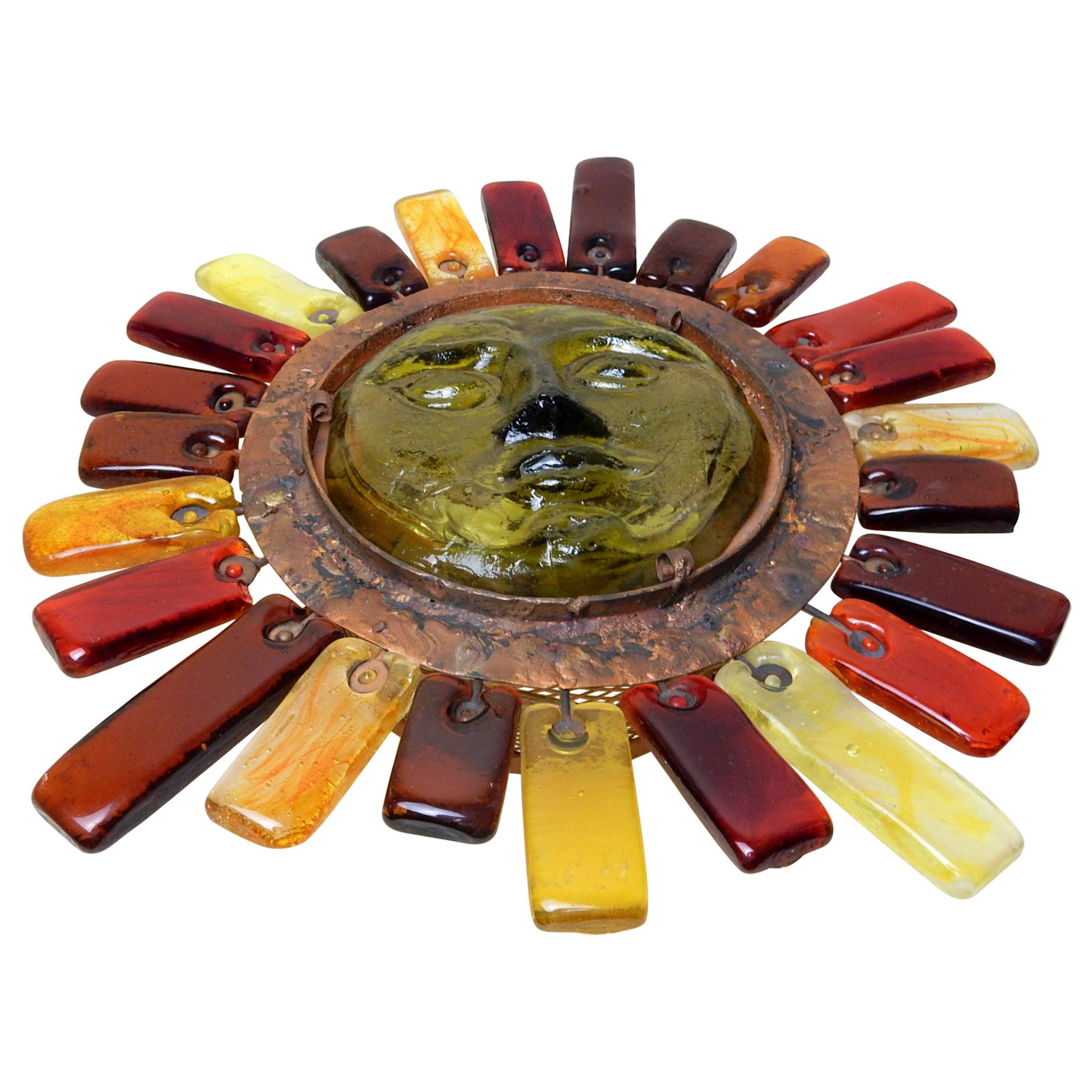Rare example of this art glass sun sconce lamp designed by Felipe Derflingher for Feders, circa 1960s
Handcrafted with amazing colored glass 