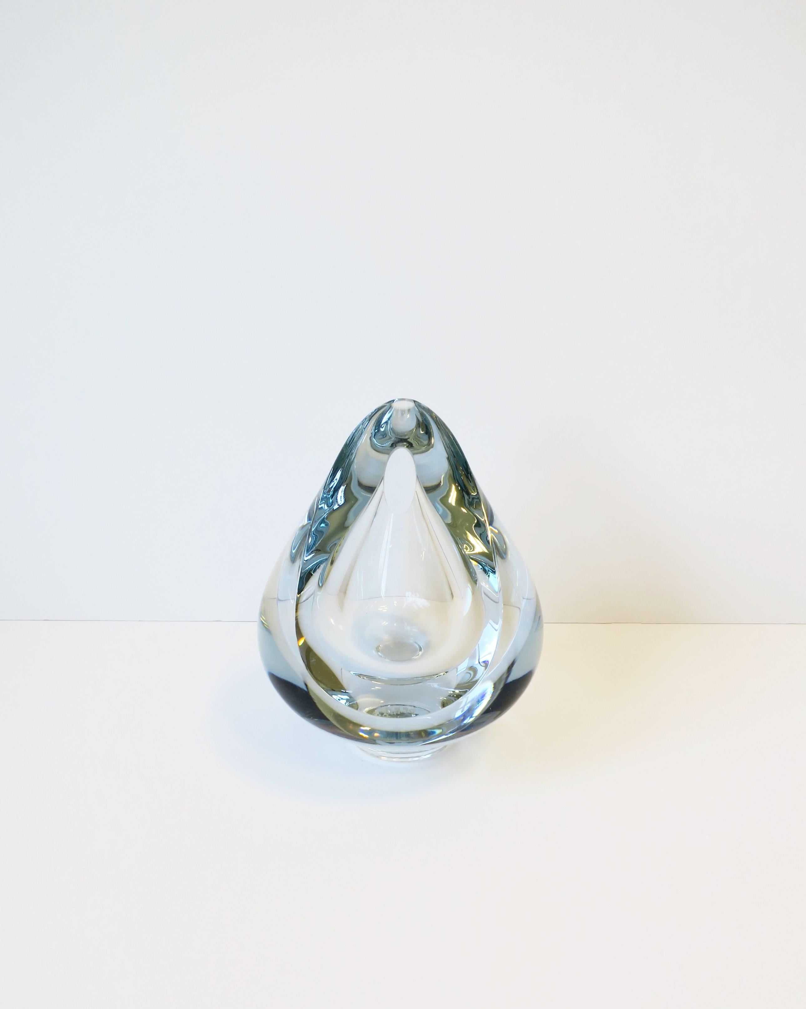 A substantial transparent clear art glass teardrop bud vase or decorative object by artist Robert Deeble, circa late-20th century, USA. Piece is signed on bottom a shown in last image. Very good condition as shown in images. No chips noted.