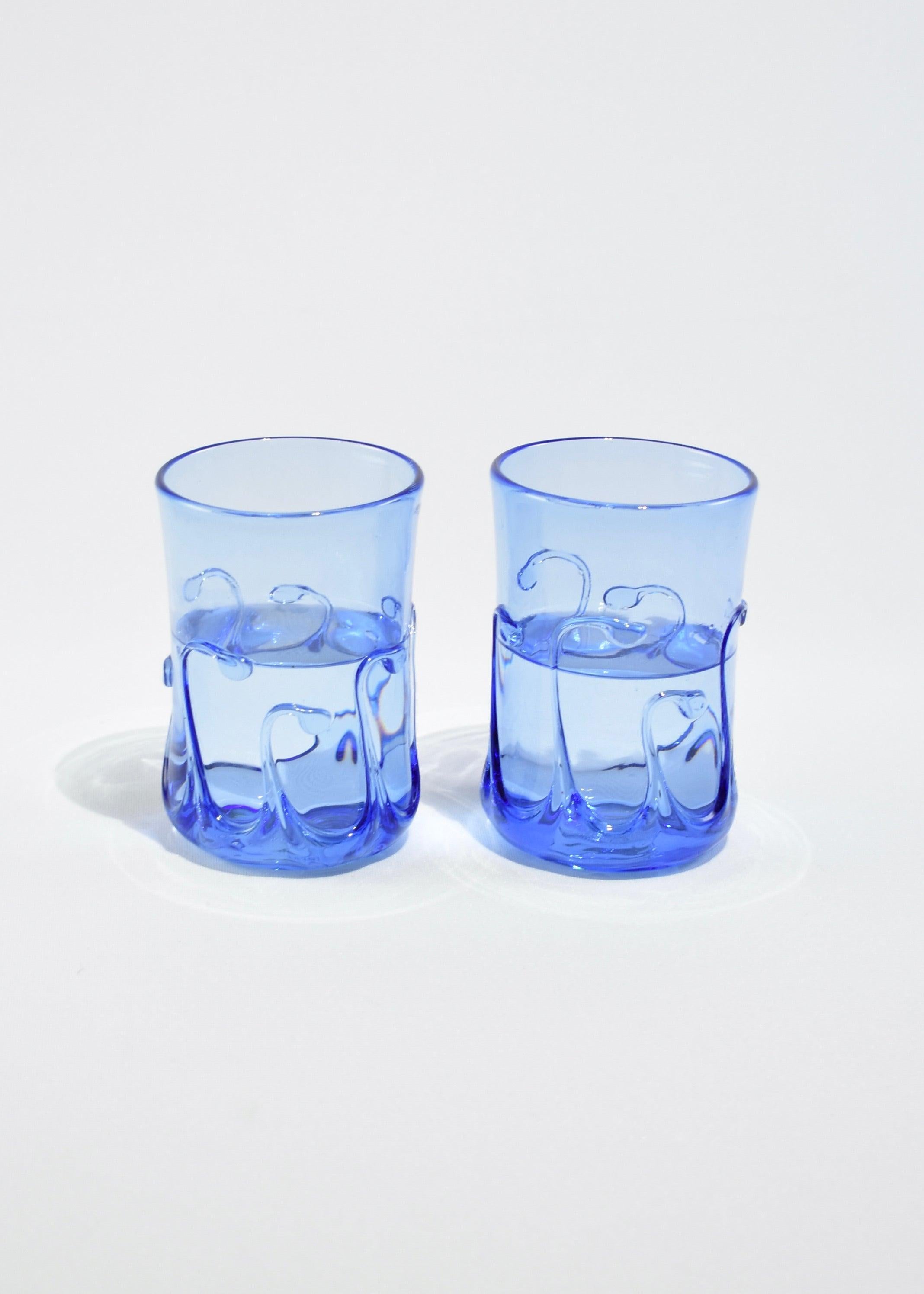 Vintage blown glass tumbler set in cobalt blue with abstract droplet design, set of two. Signed on base.
