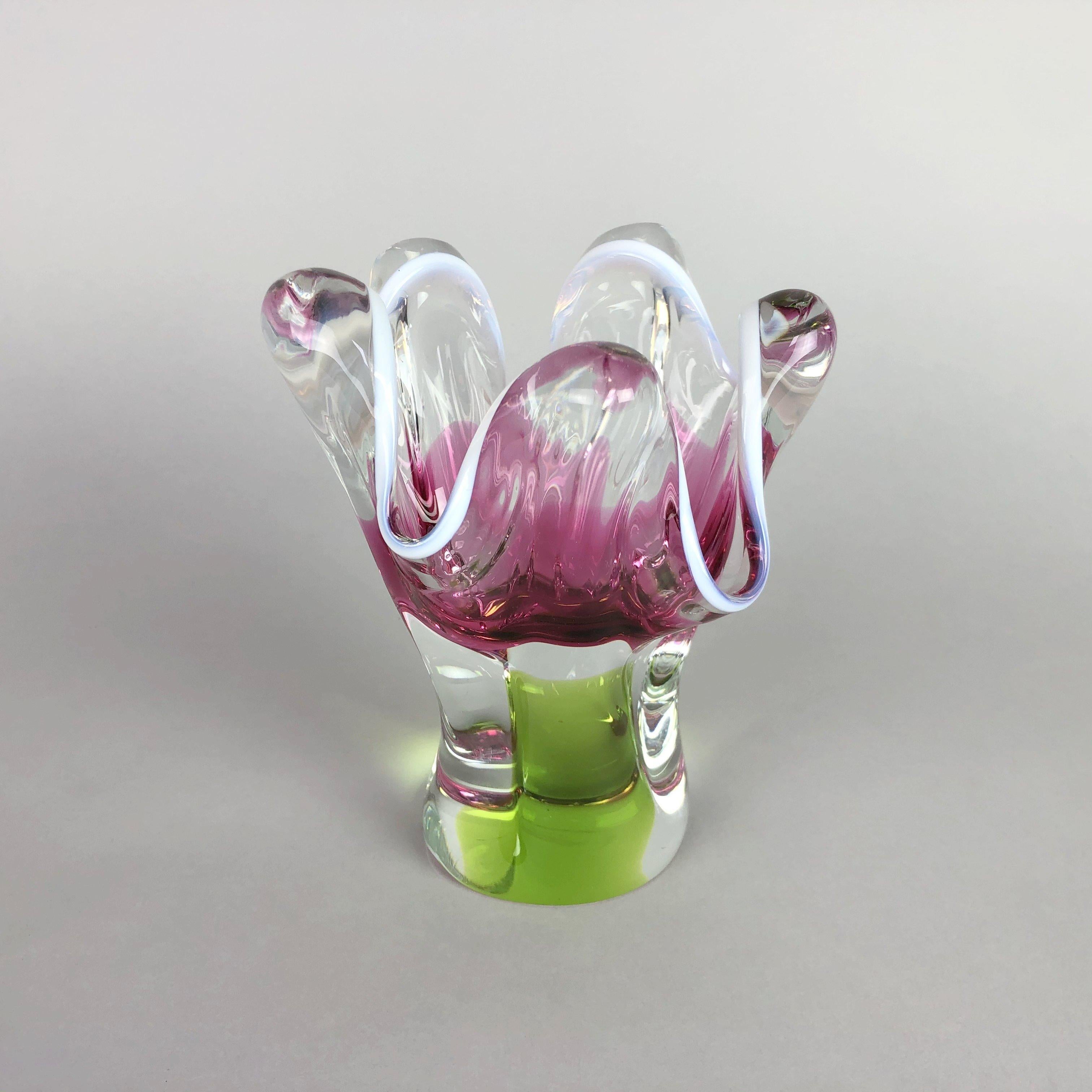 Sculptural Czech art glass vase, designed by Josef Hospodka in 1960s and made by the Chribska glassworks. Combination of pink, green and clear glass with a lovely opaque white rim. Very good vintage condition.
