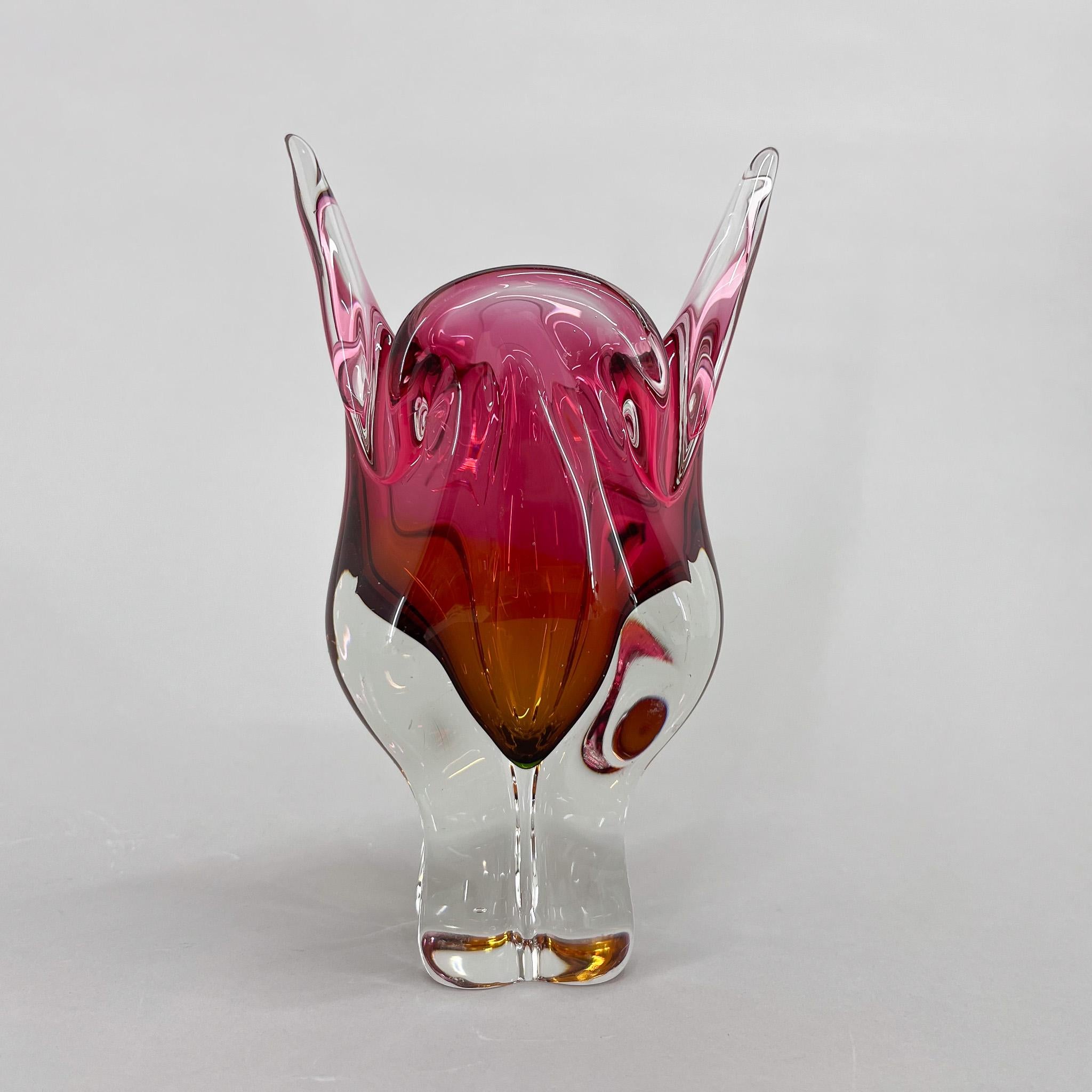 Bohemian, heavy, art glass vase designed by Josef Hospodka for Chribska glassworks. It was made in Czechoslovakia in the 1960's and the design is sometimes called 'Cat's head'. 
