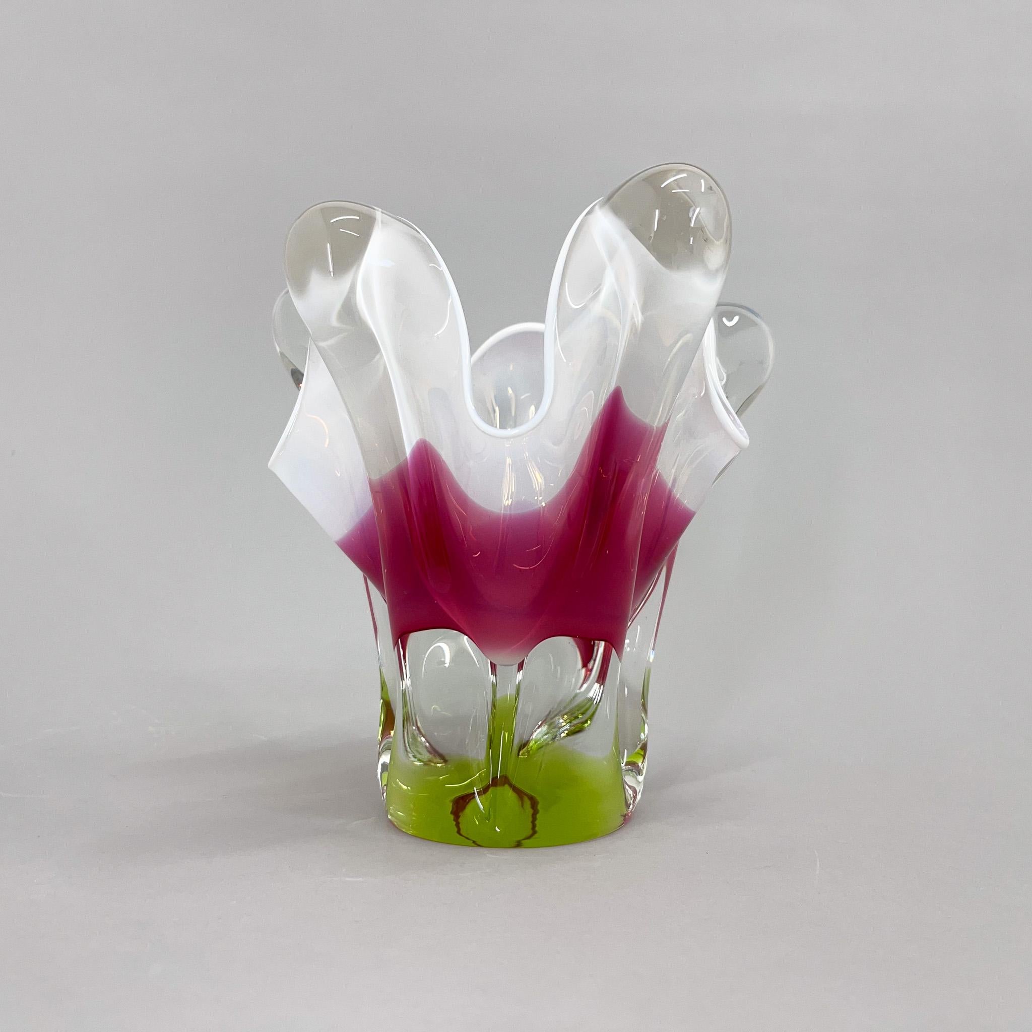 Sculptural Czech art glass vase, designed by Josef Hospodka in 1960's and made by the Chribska glassworks. Combination of pink, green and clear glass with a lovely opaque white rim. Very good vintage condition. 
