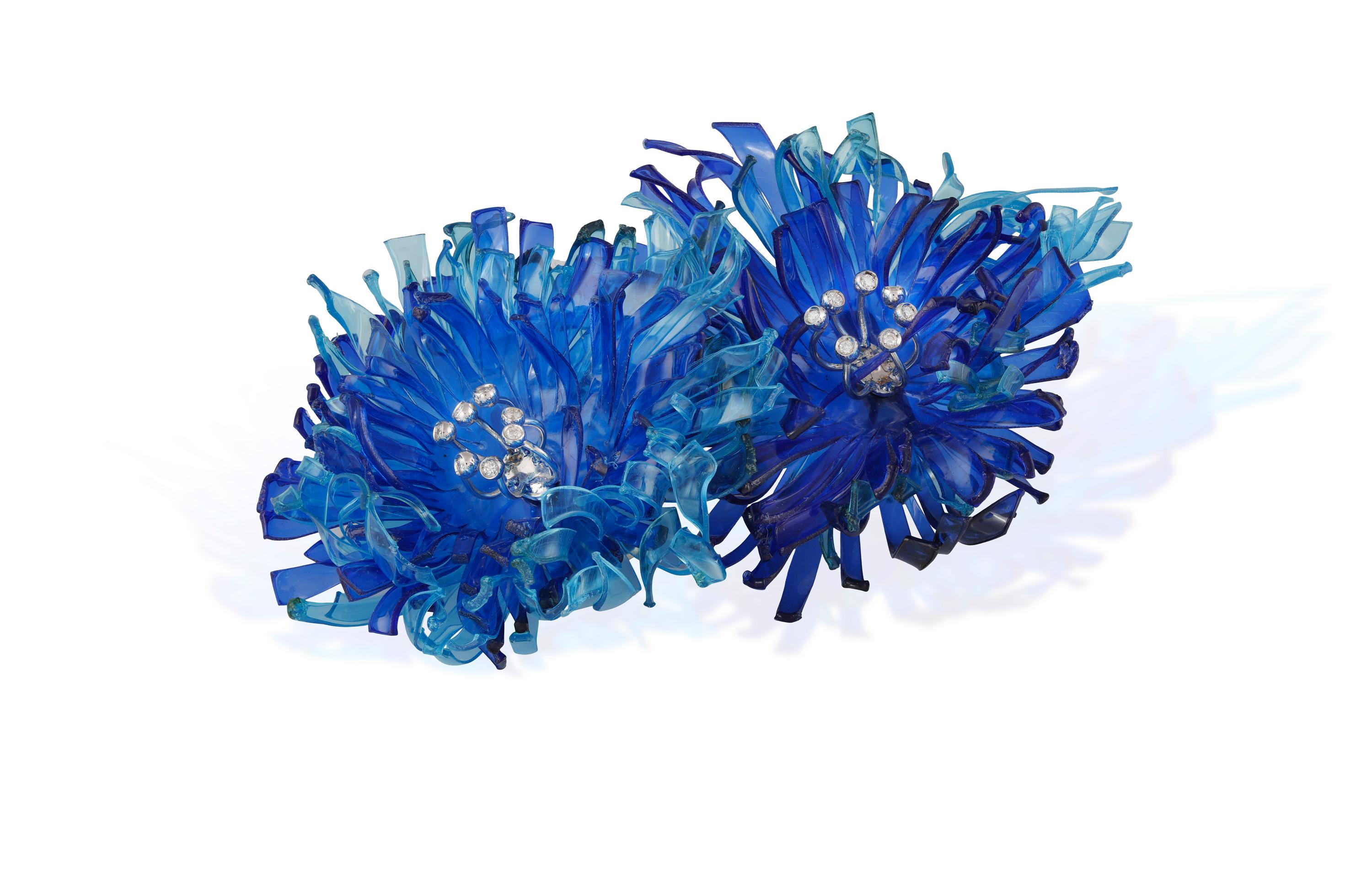 MARGHERITA BURGENER _ ENRICA BORGHI
Precious Plastic Jewels 
Margherita Burgener's creations are born in an artisan workshop in Valenza, birthplace of Italian high jewelry. Every jewel of the brand - 100% made in Italy - tells the special alchemy