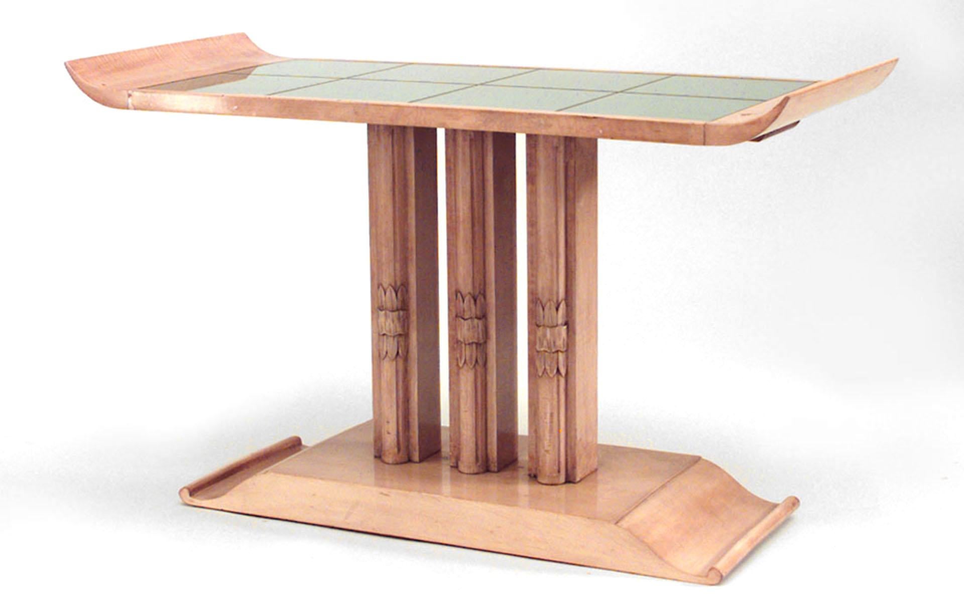 American Art Moderne rectangular sycamore high coffee table with carved triple column pedestal base and eight mirrored panels on top. (attributed to: T.H. ROBSJOHN GIBBINGS)
