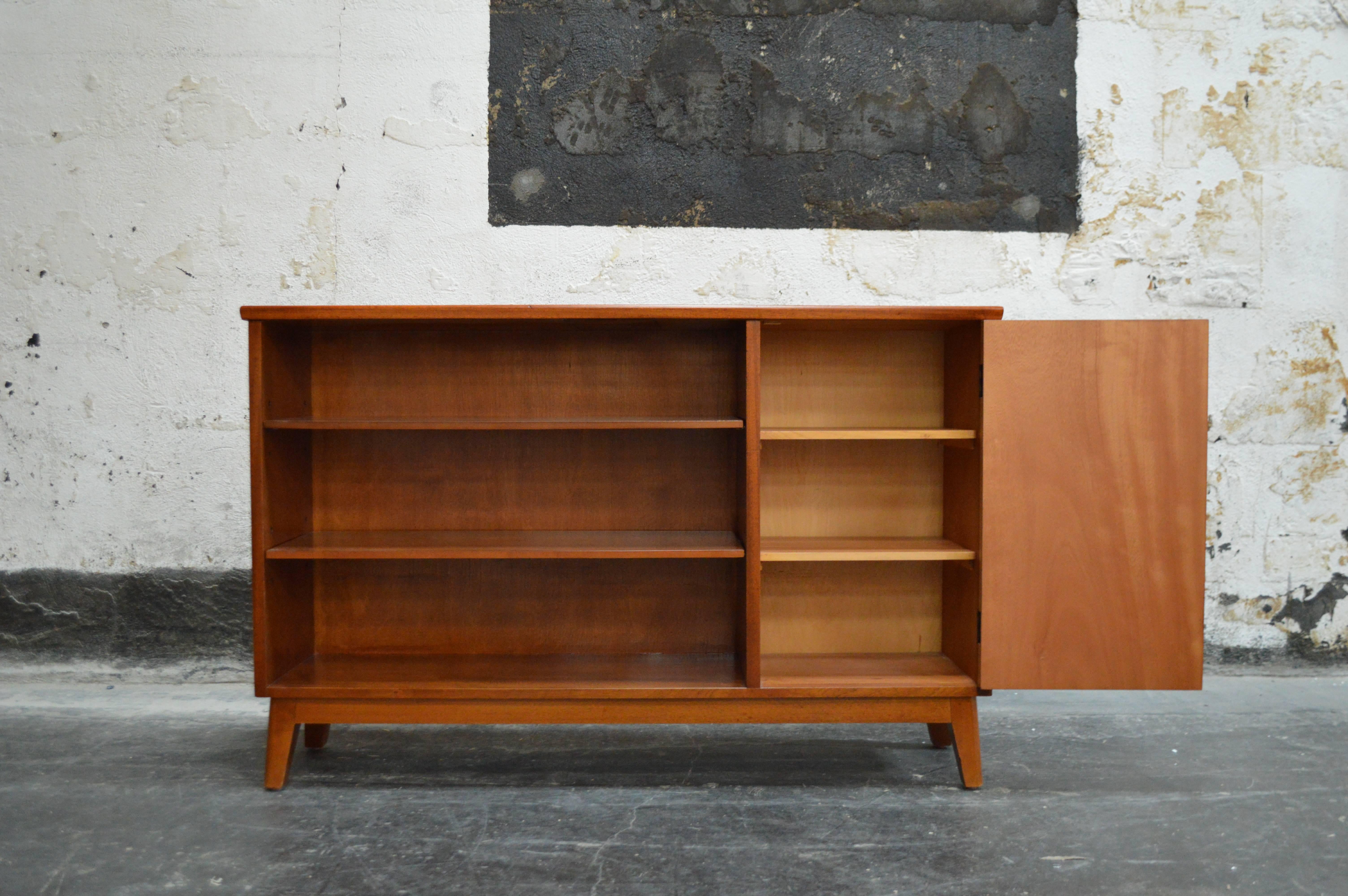 Handsome mahogany bookcase with a cabinet section for storage, newly restored. Adjustable shelves. Perfect as a slim console or stand for a flatscreen TV.