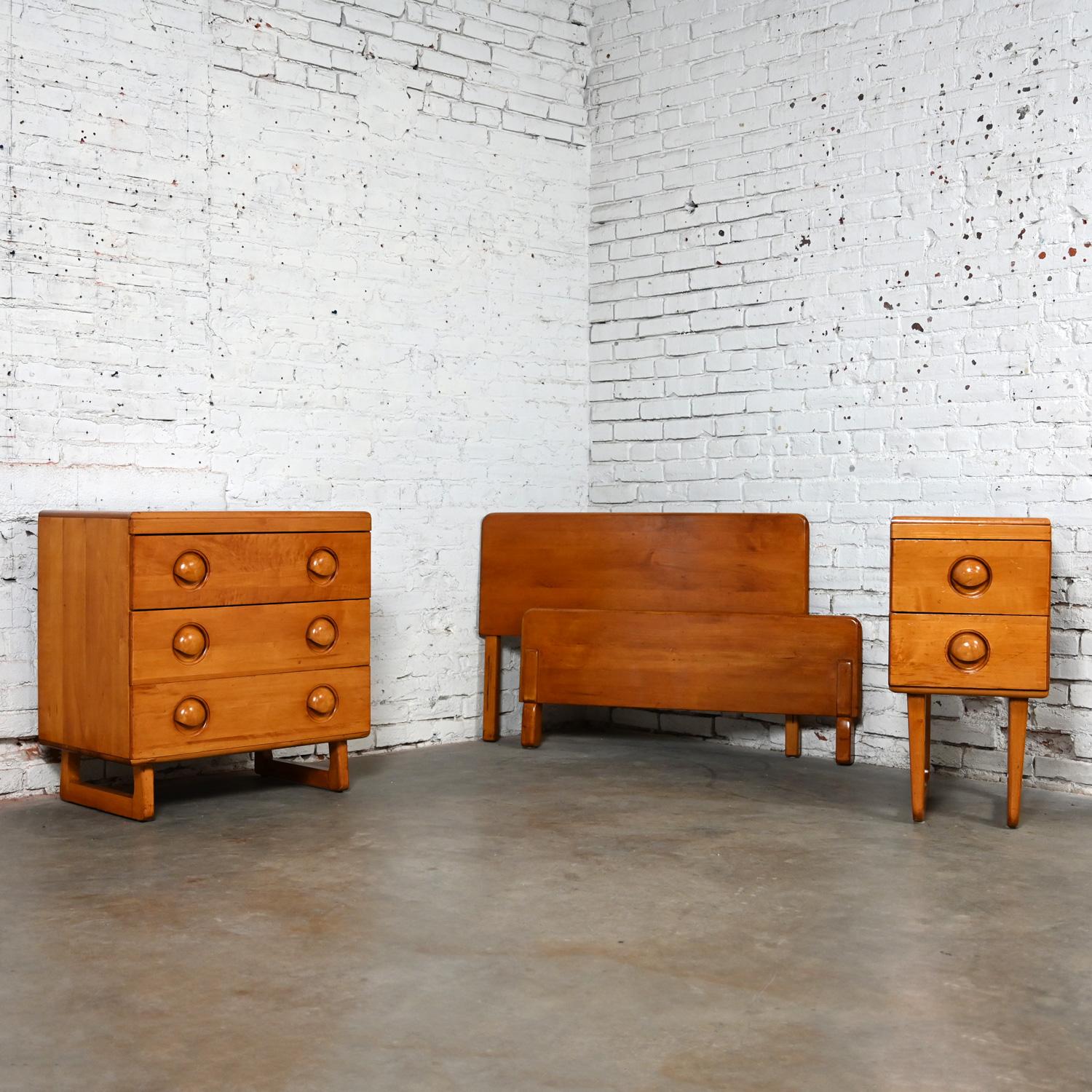 Wonderful Early to Mid-20th Century Art Moderne solid maple twin bed headboard & footboard, small 3 drawer chest or cabinet, and 2 drawer nightstand in the style of Bissman and after Russel Wright for Conant Ball. These pieces have been attributed