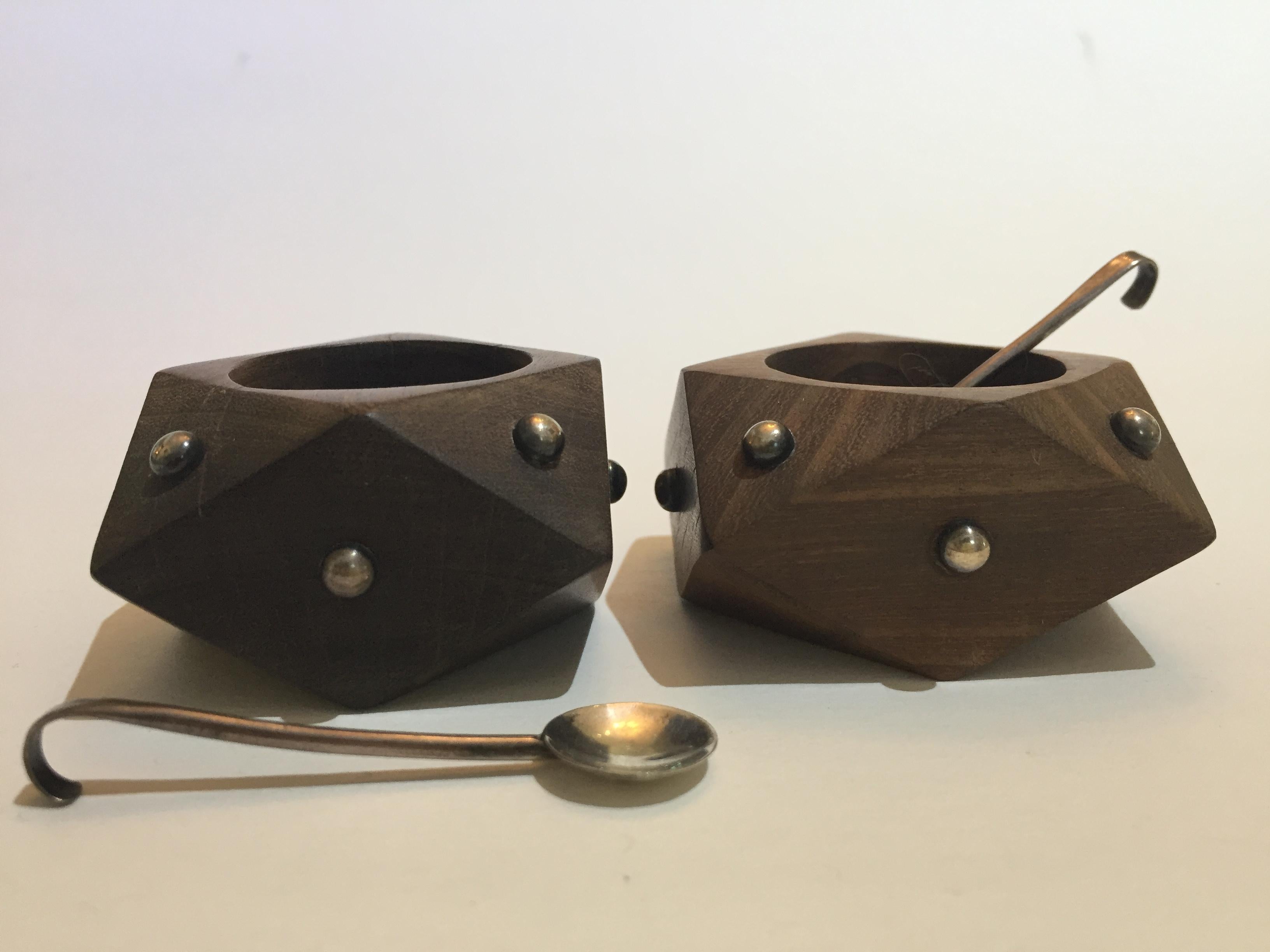 1940s Art Moderne pair of rosewood salt cellars with Spratling's signature sterling balls adornment. Each has a sterling 925 marked Taxco miniature spoon for dipping salt or whatever you choose.