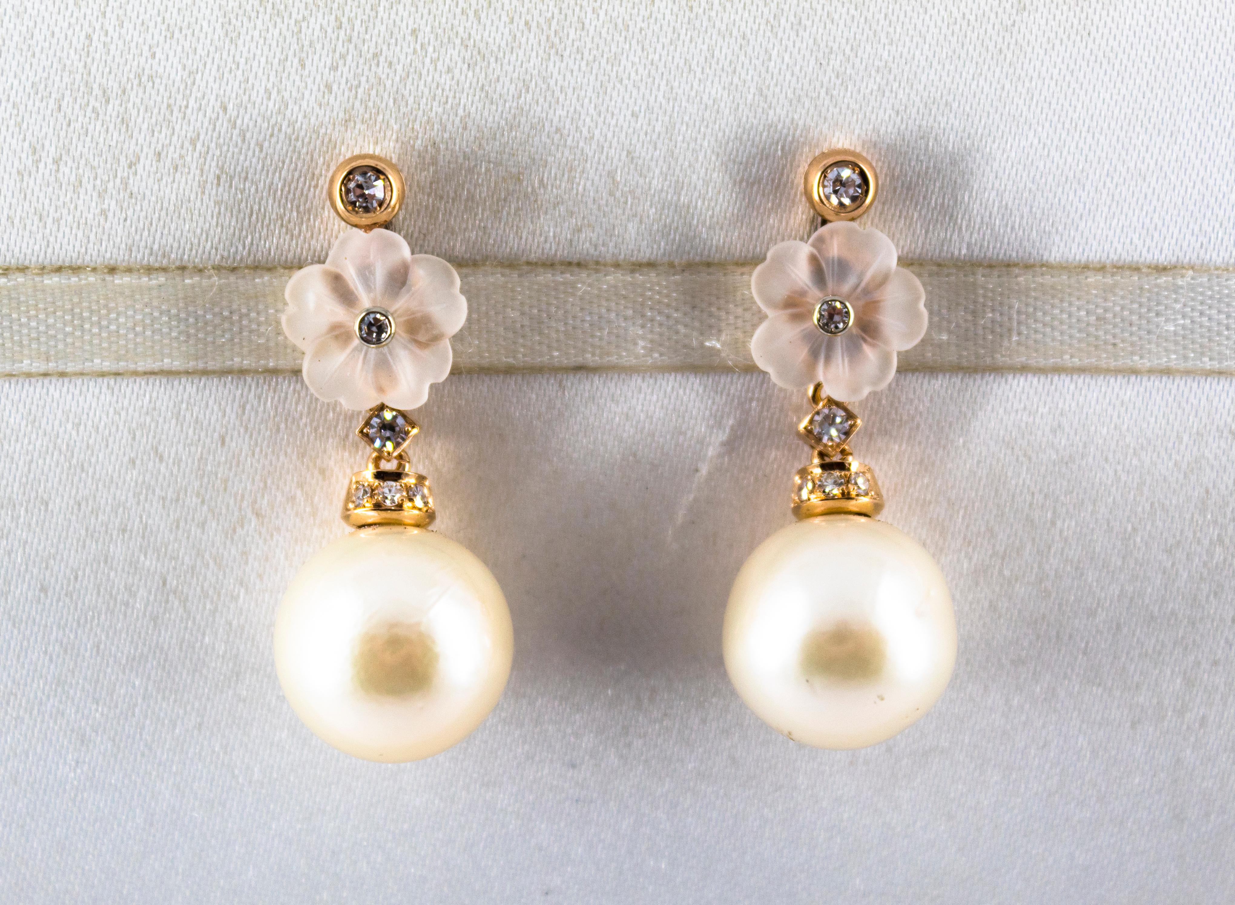 These Stud Earrings are made of 14K Yellow Gold.
These Earrings have 0.20 Carats of White Diamonds.
These Earrings have also 35.00 Carats of Pearls and Rock Crystal.
These Earrings are available also with Green Flowers made of Agate or Purple