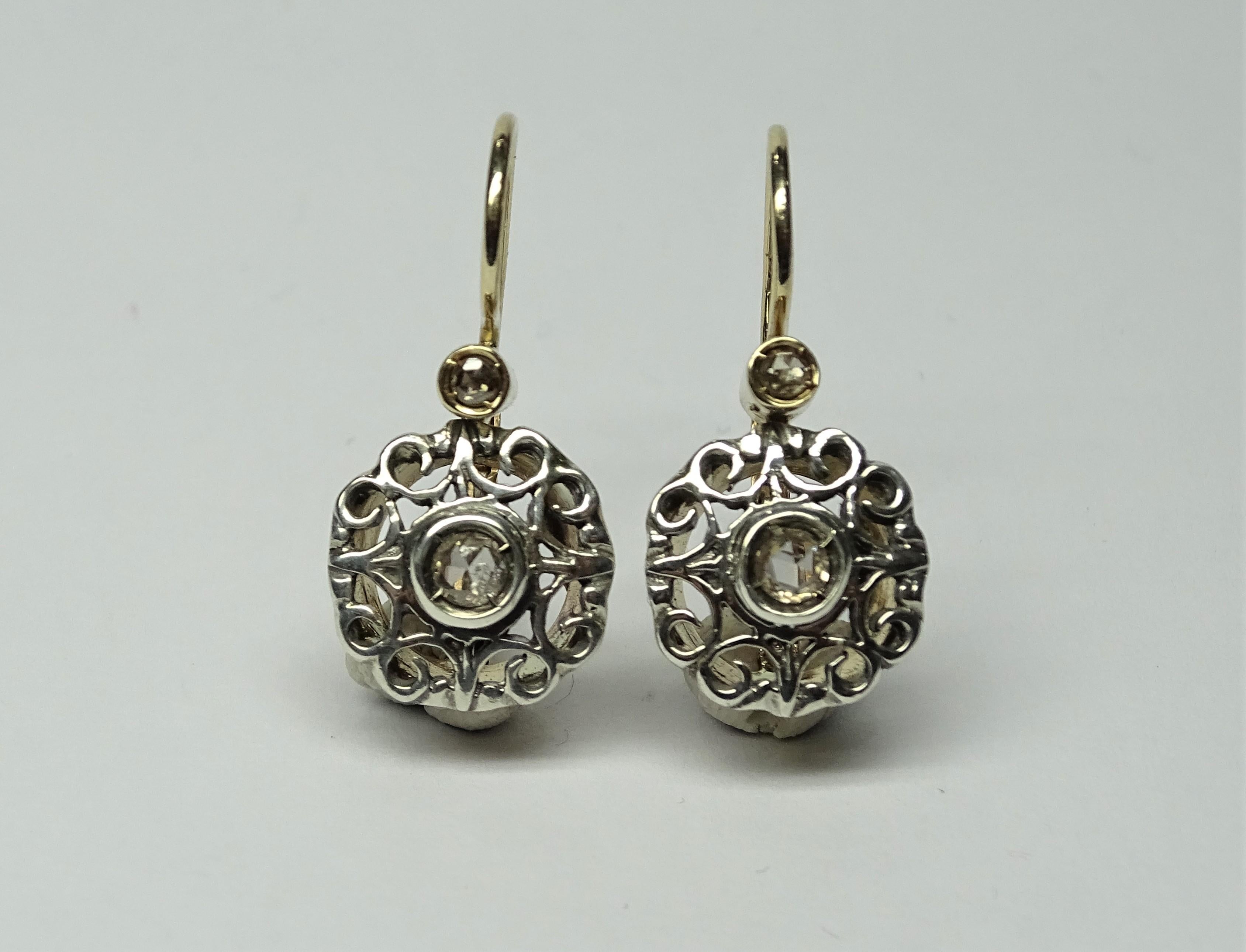 These Earrings are made of 14K Yellow Gold and Sterling Silver.
These Earrings have 0.28 Carats of Rose Cut Diamonds.
These Earrings are inspired by Art Nouveau
All our Earrings have pins for pierced ears but we can change the closure and make any